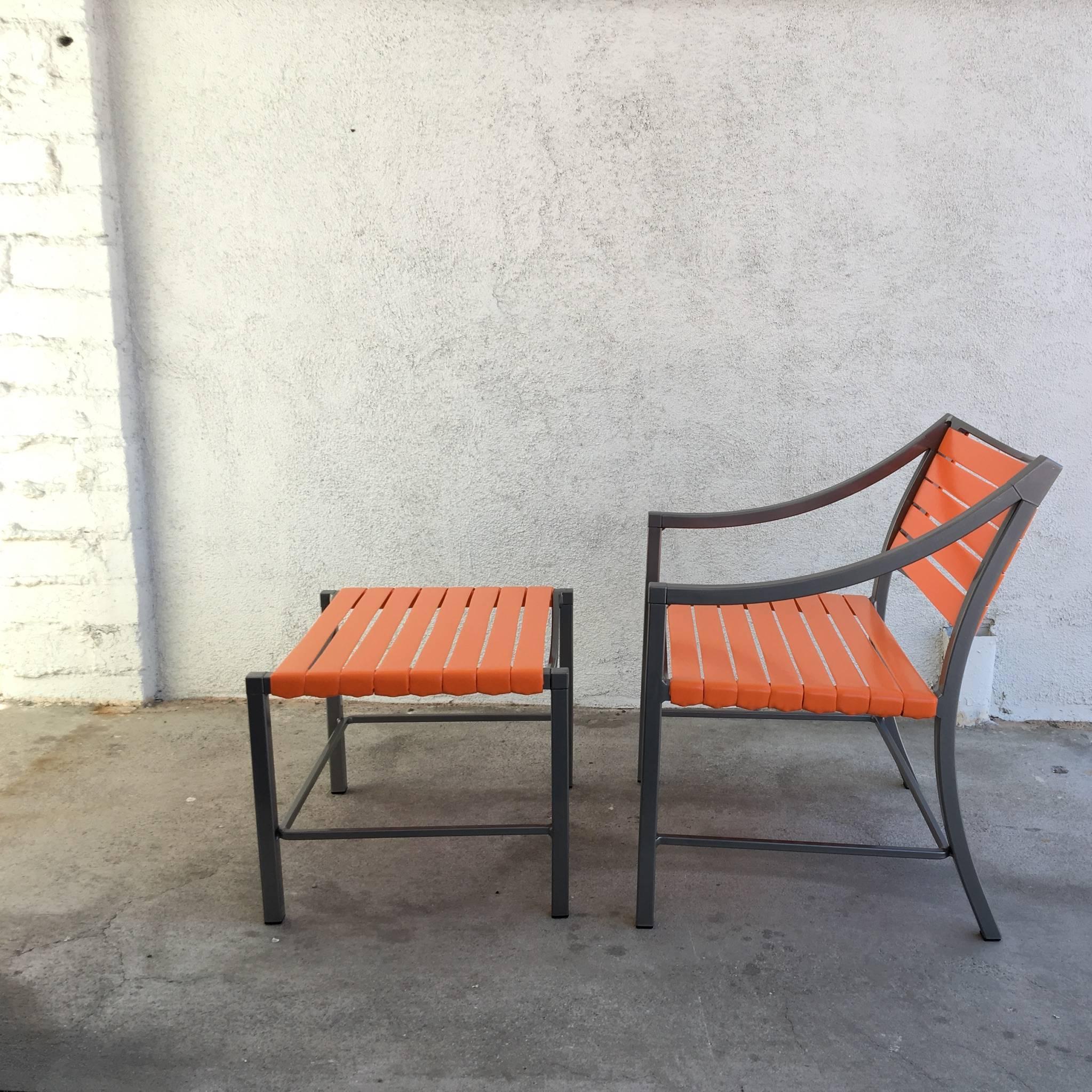 A amazing 1970s pair of outdoor chairs and Ottomans by Brown Jordan.
Newly professionally restored in a charcoal grey and tangerine orange straps.
Dimensions:
Chair: 28.75