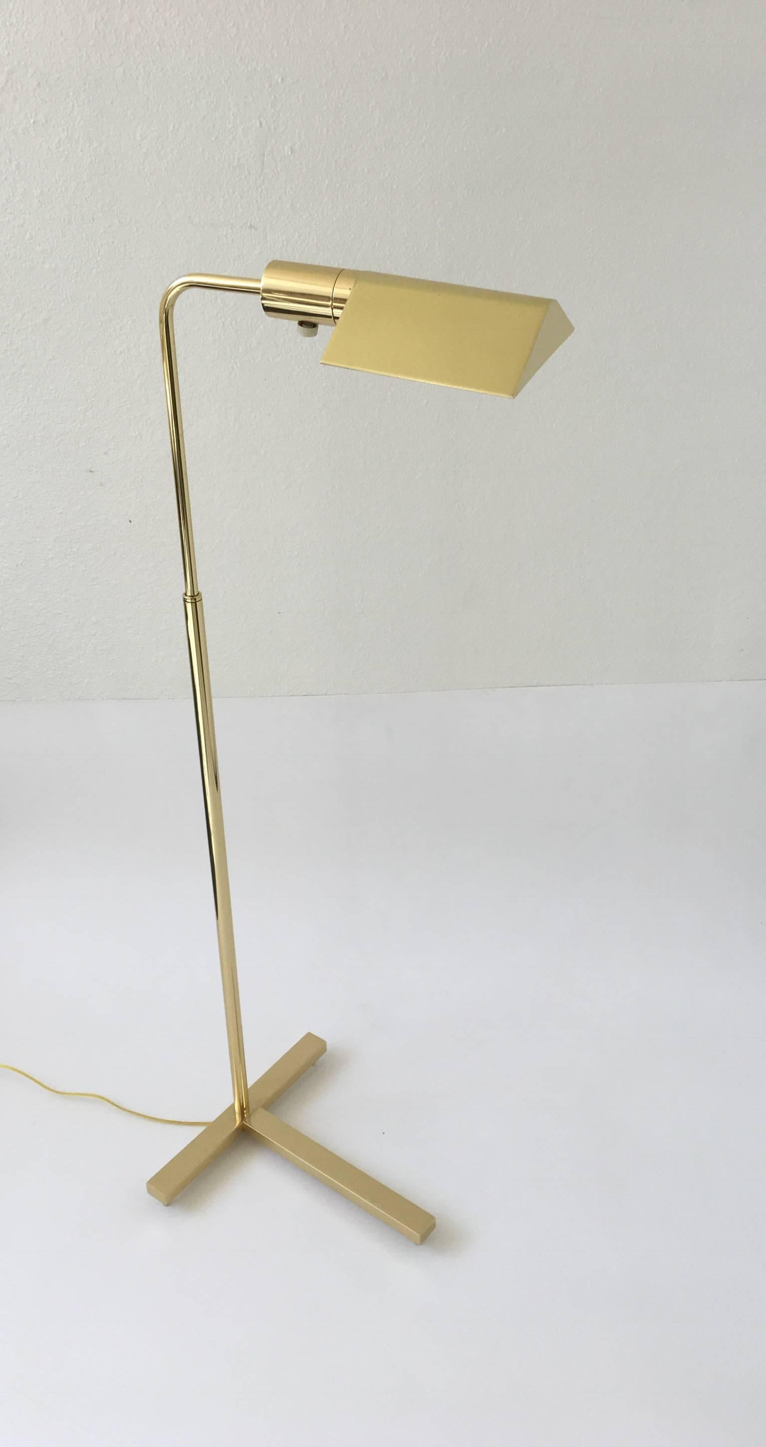 A beautiful polished brass adjustable reading floor lamp by Casella lighting.
The lamp has been newly re-plated and rewired with a full range control dimmer. The lamp can be turned 360* and lower and raised. When the lamp is raised all the way up