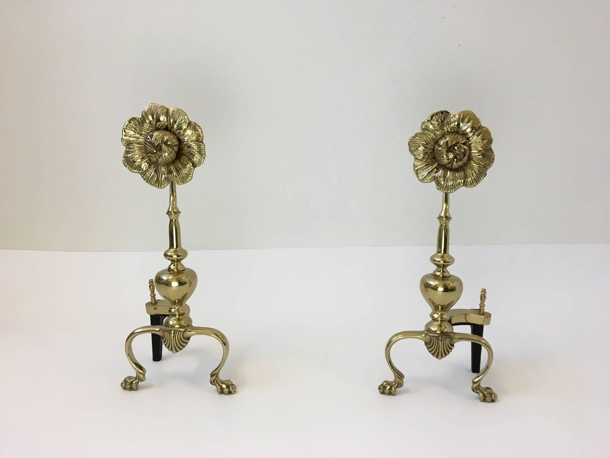 A pair of 1970s glamorous polished brass flower andirons.

 