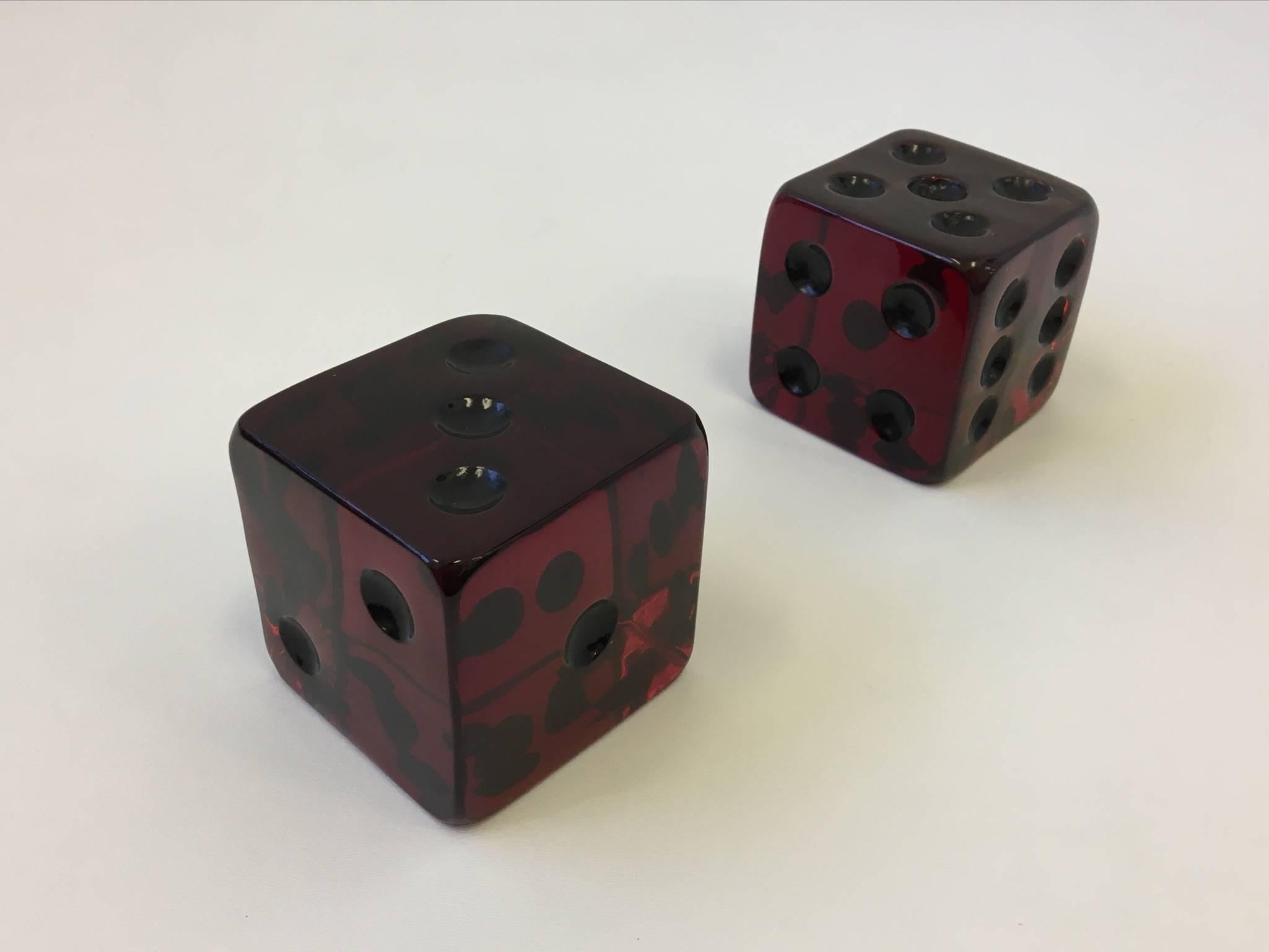 A pair of large-scale sculptural burgundy acrylic dice by renowned acrylic designer Mr. Acrylic Charles Hollis Jones. This can be used as bookends or as sculptures. This are from the 1970s 

Dimensions: 3.75