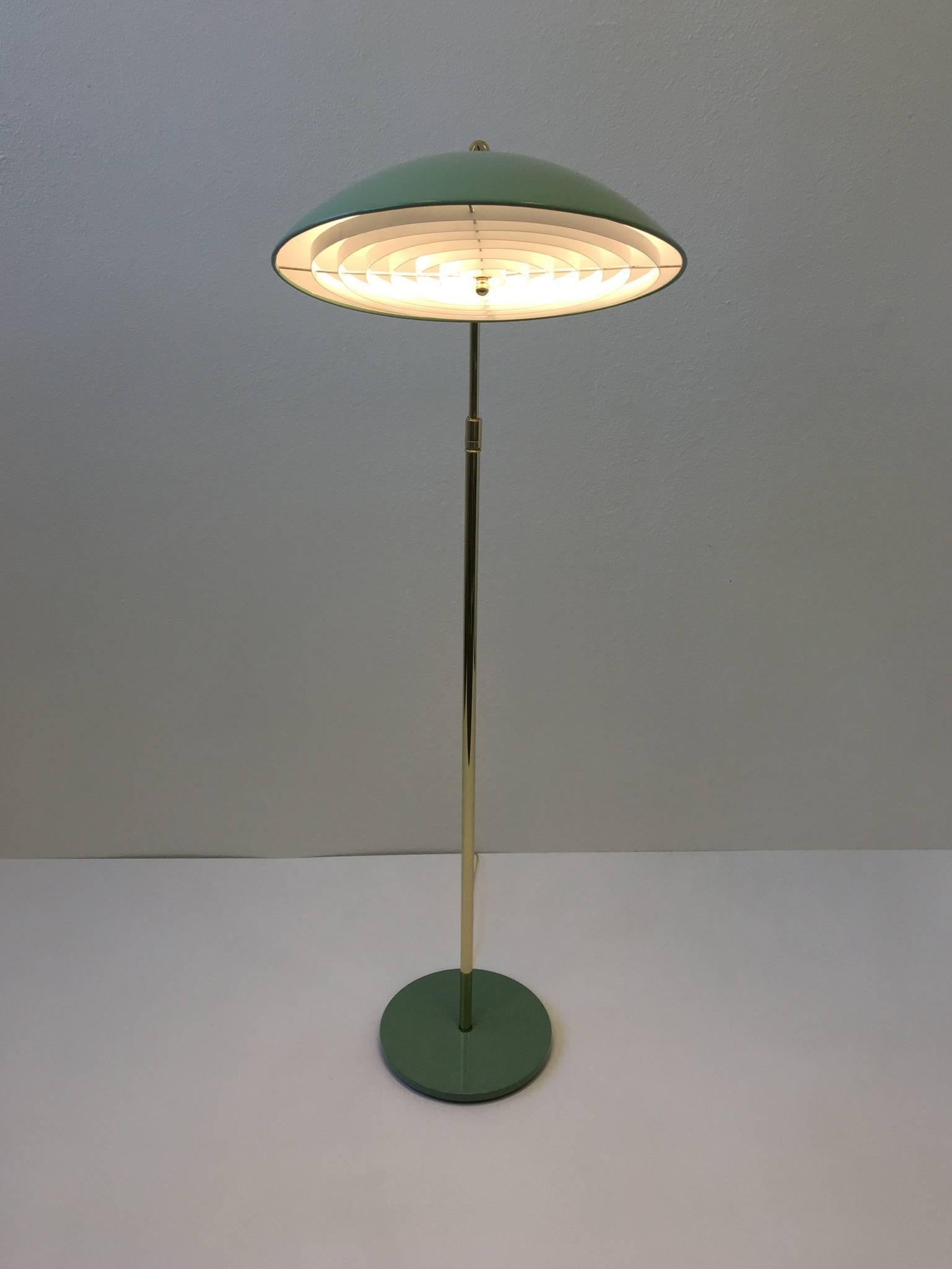 Mid-Century Modern Brass and Lacquered Fern Green Adjustable Floor Lamp by Kurt Versen