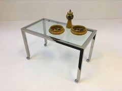 Chrome and Glass on Casters Side Table, style of Milo Baughman