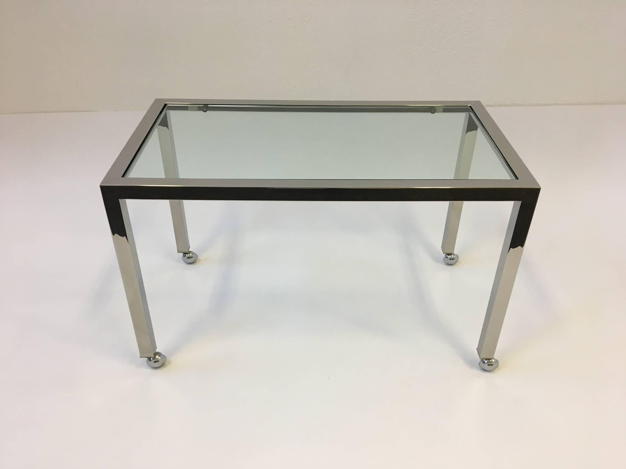 American Chrome and Glass on Casters Side Table, style of Milo Baughman