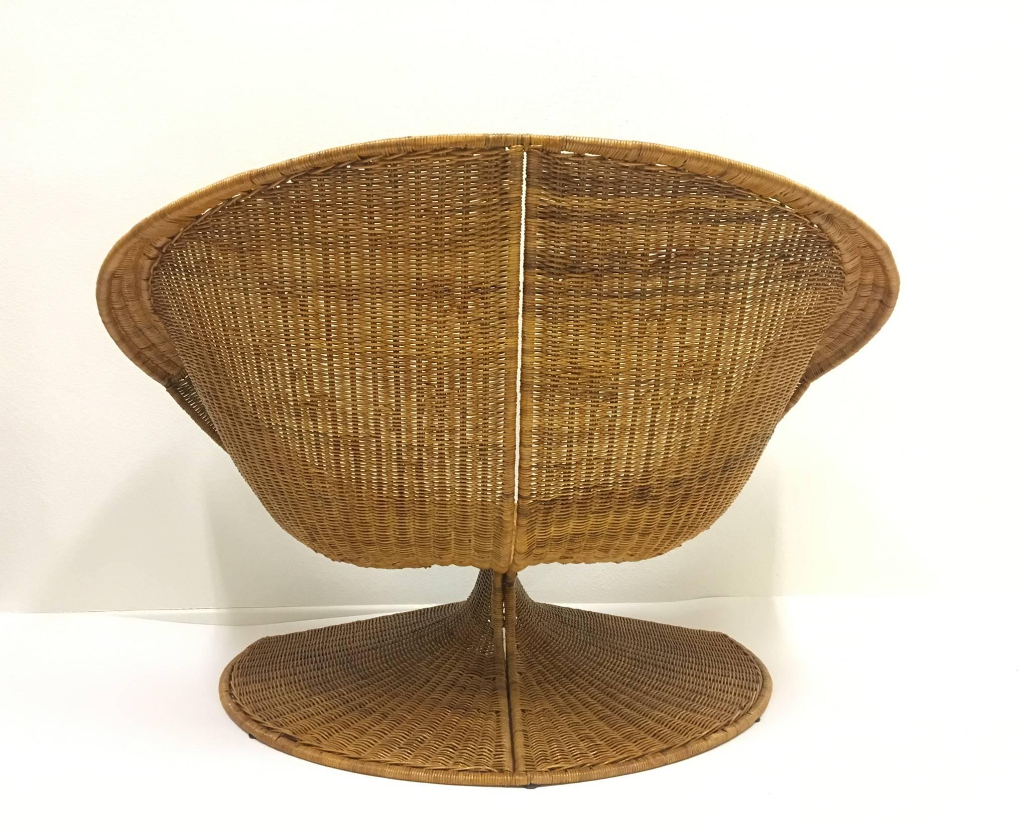 A sculptural and rare "Lotus" wicker lounge chair and ottoman designed by California designer Miller yee Fong for Tropi-Cal in the 1968 
It's rare to find the chair with the ottoman. The "Lotus" chair is an Iconic California