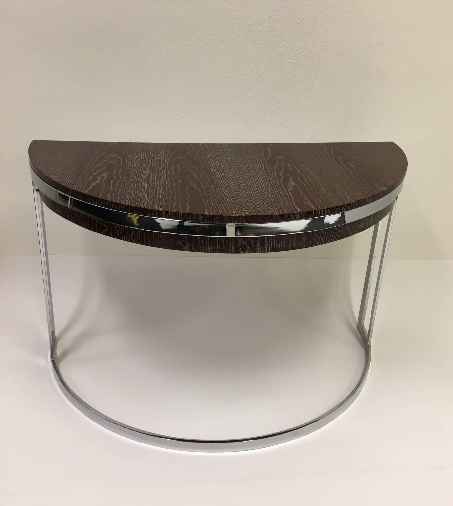 A beautiful cerused and polished chrome desk with a drawer designed by Milo Baughman in the 1970s. The oak desk has been newly refinished in a dark brown with white cerused.
Dimensions: 30.75 inches high 48 inches wide 24 inches deep.