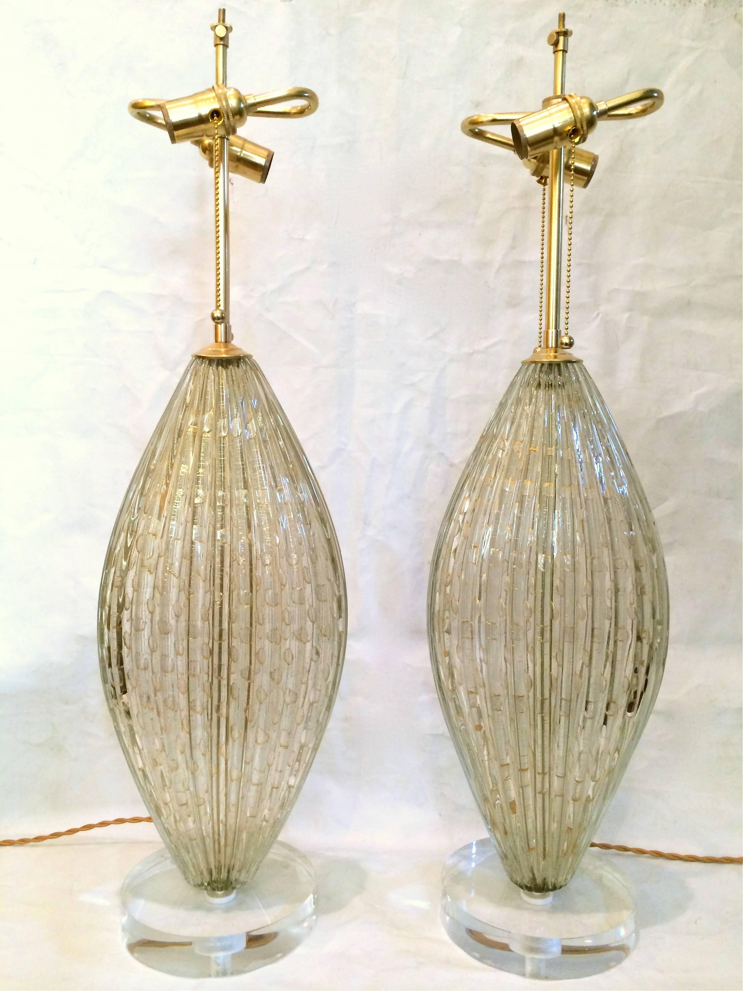 Stunning pair of large hand blown oval shaped Murano table lamps with controlled 