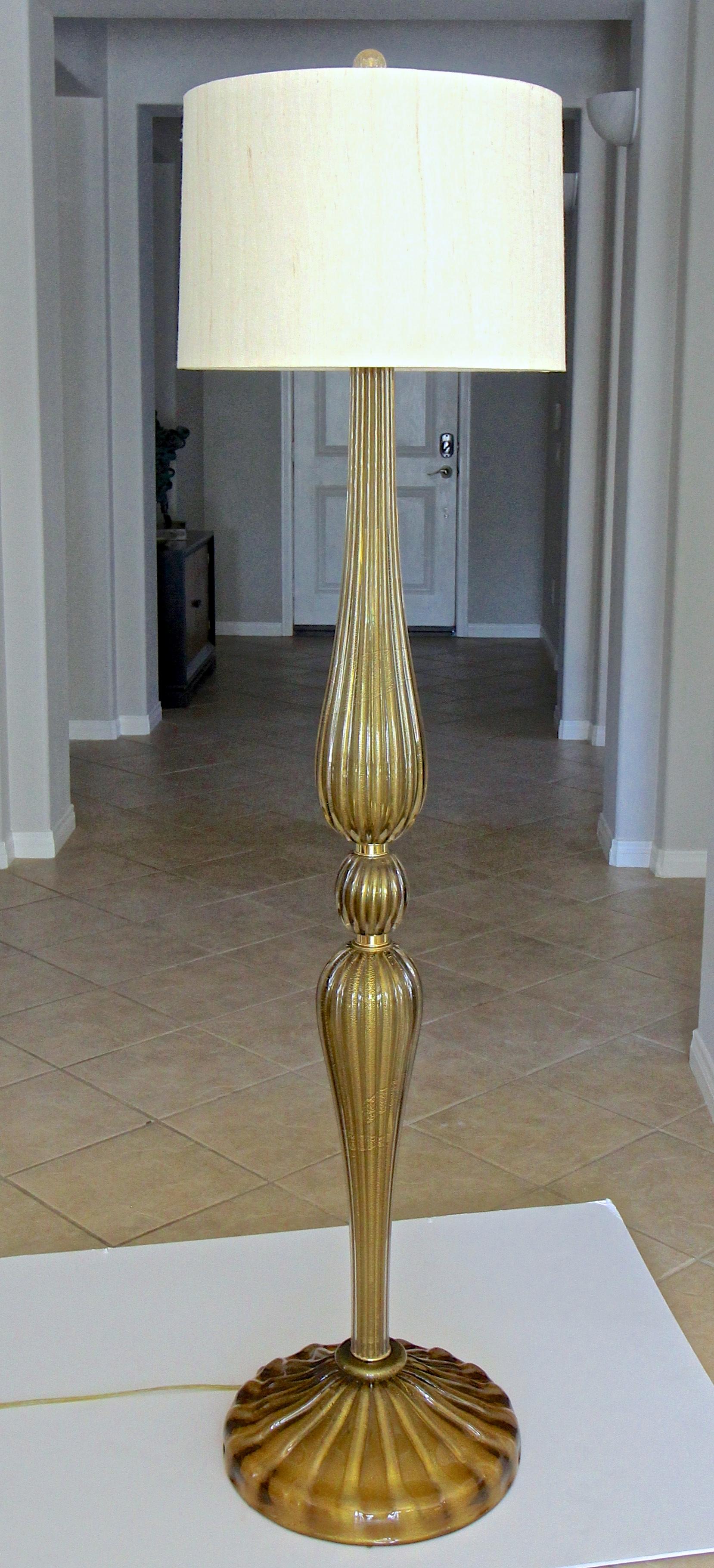 Italian Murano hand blown ribbed bronzed color glass with gold inclusion floor lamp. Newly wired for US including 3-way socket and cord. The expertly crafted glass consists of 2 large reeded tapered elements, resting on large fluted base. Also