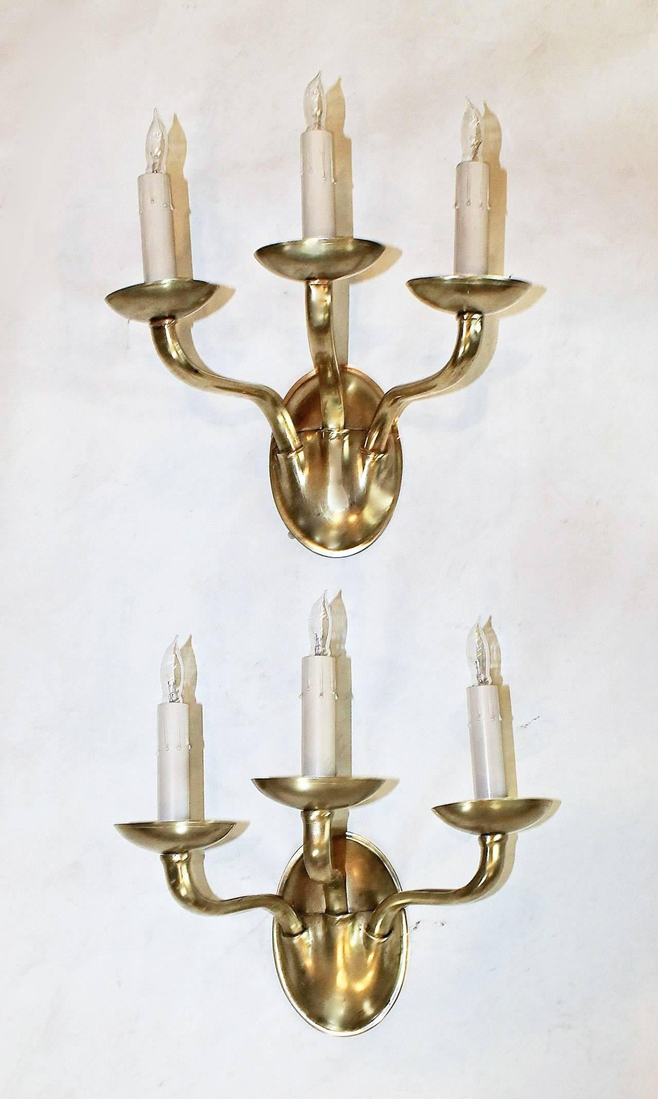 American Pair of EF Caldwell Arts and Crafts, Three-Arm Brass Wall Sconces
