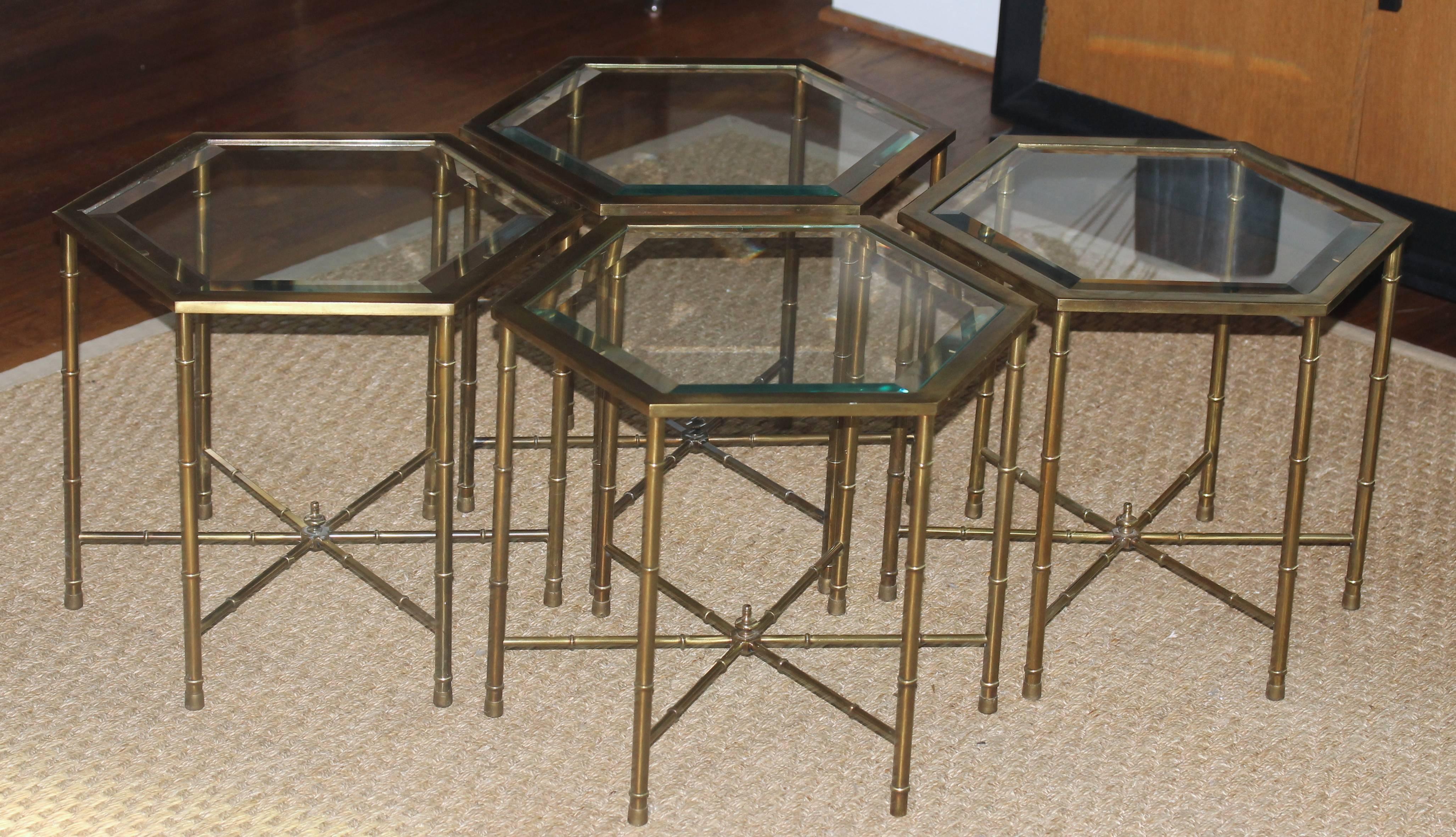 4 hexagonal brass faux bamboo side or occasional tables with inset beveled glass tops by Mastercraft. Price is per single table.