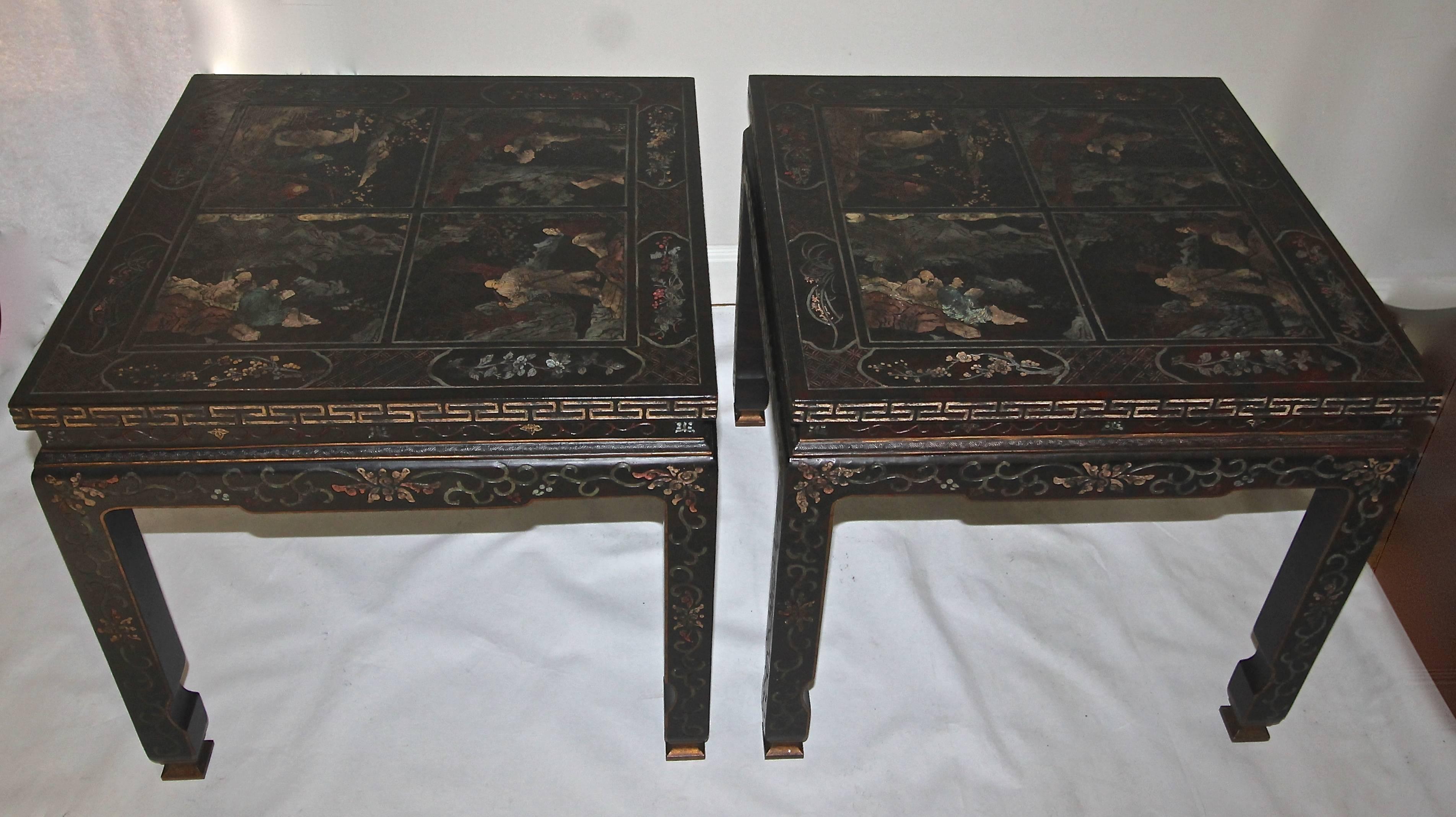 Exceptional pair of large-scale Asian inspired side or end tables with polychrome chinoiserie and Greek key motif by Baker Furniture. The top of each table features four chinoiserie scenes that are placed so as to be enjoyed from all sides. Tables