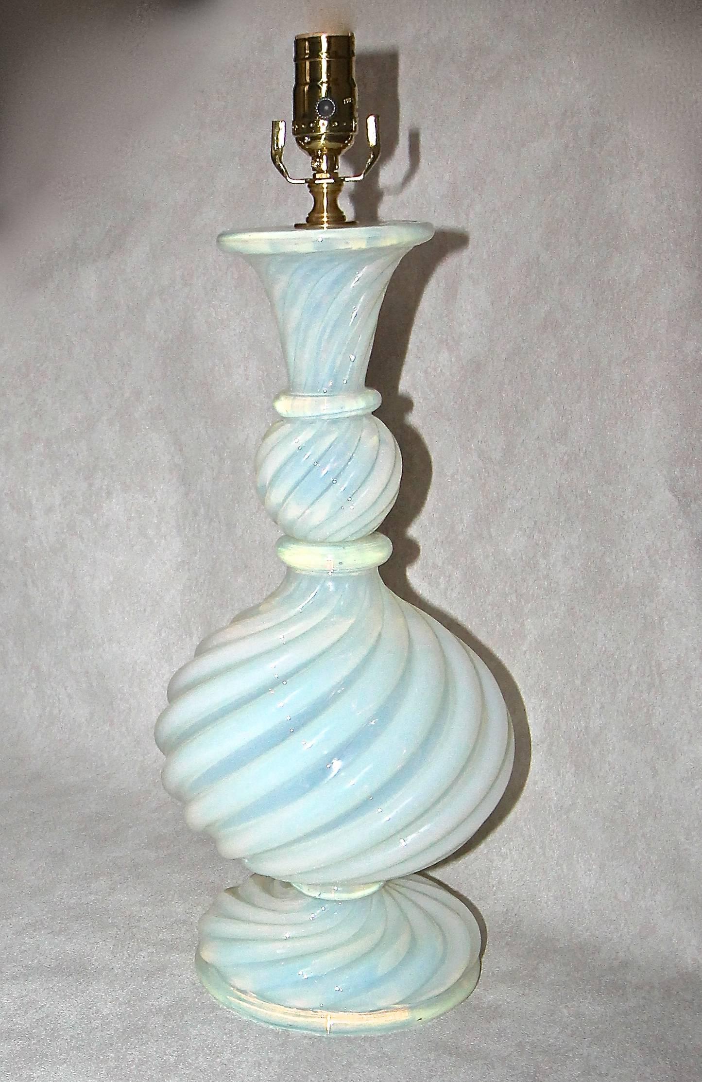 Very rare Italian Murano lamp in opalescent swirled glass by Barovier e Toso. Retains original paper label on base. New wired for US with brass hardware and French style twisted rayon covered cord. 

Height to top of glass is 17.5
