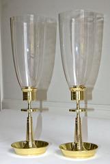 Pair of Tommi Parzinger Brass Hurricane Glass Candlesticks