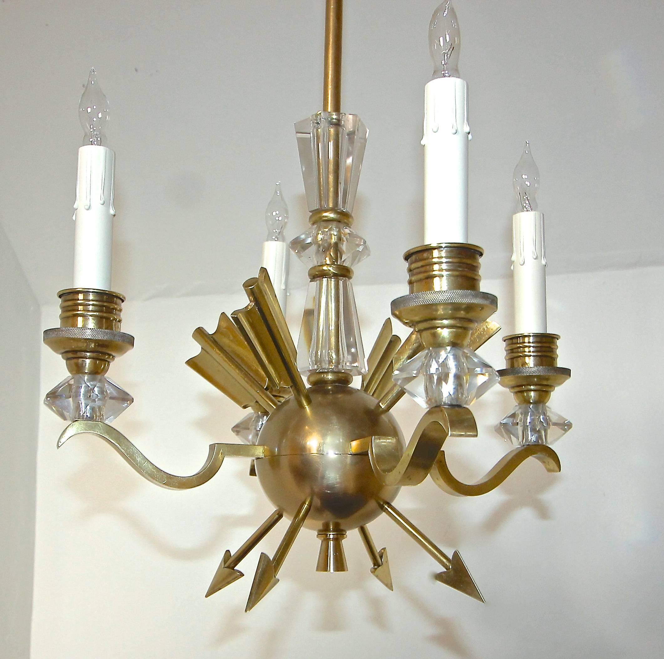 French four-arm Directoire style brass chandelier with arrow motif and crystal accents in the manner of Jules Leleu. Chandelier uses 4 - 40 watt max candelabra base bulbs, newly wired for US. 

Measure: Fixture alone is 15