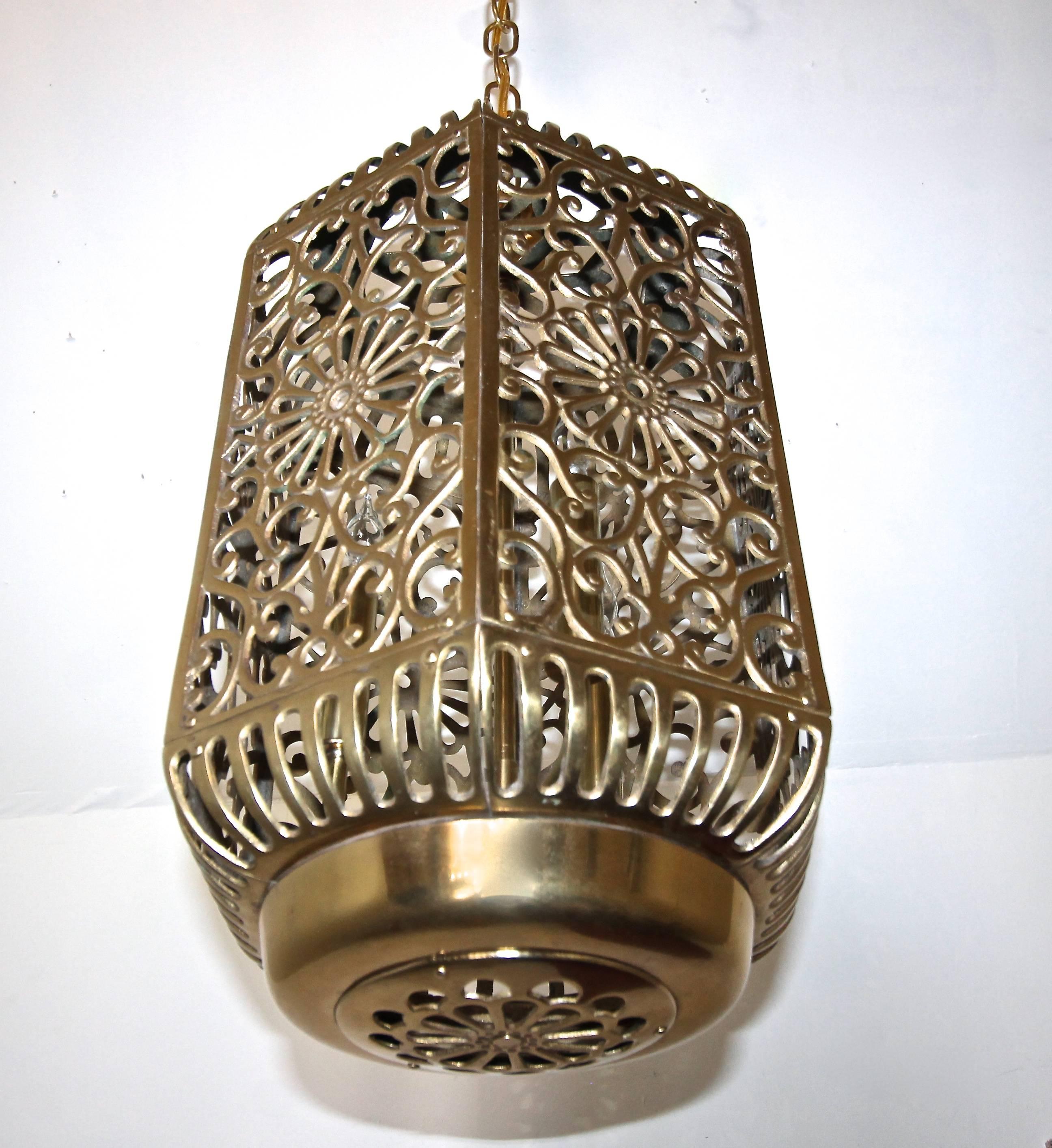 A large and high quality filigree brass ceiling or pendant light with 