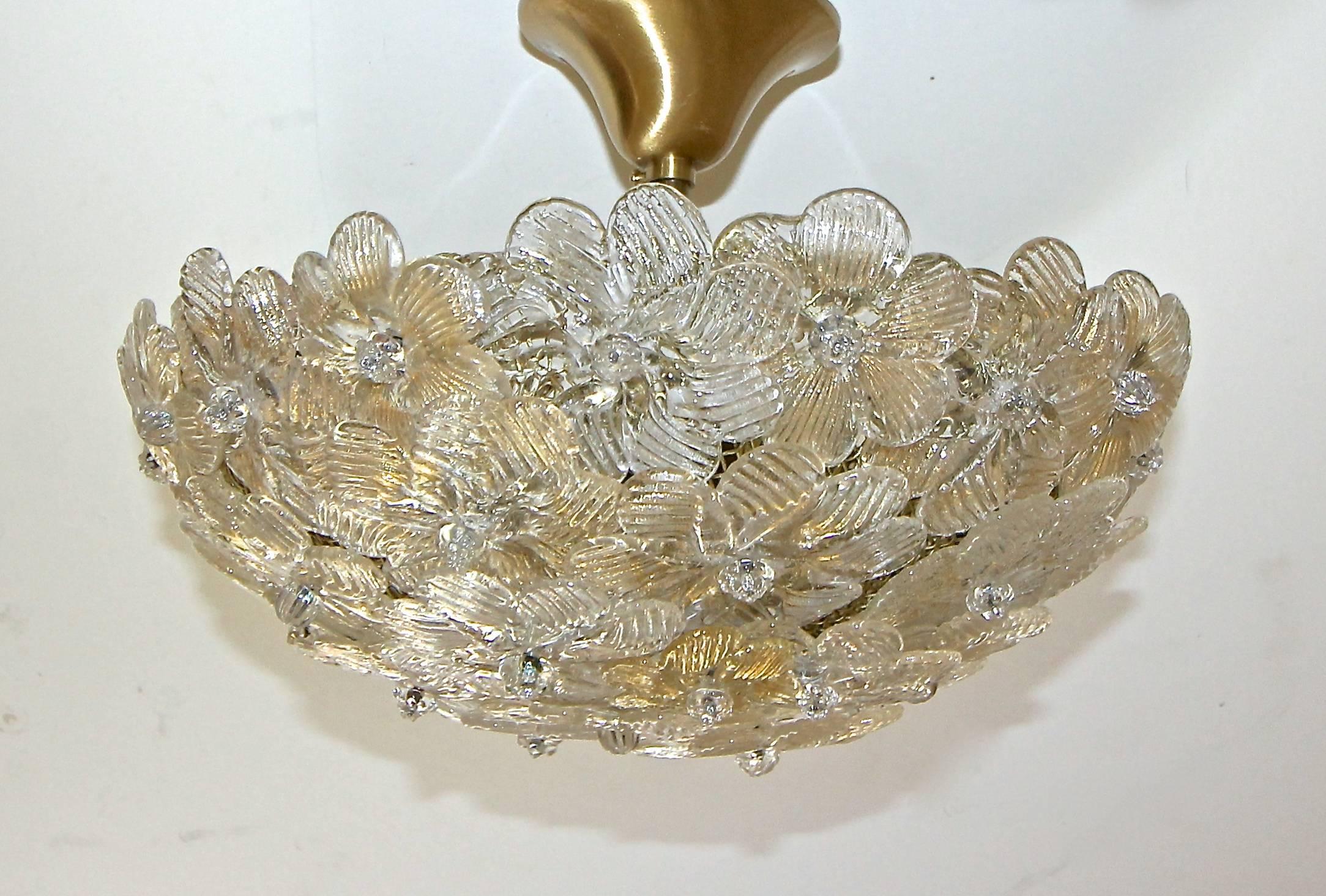 Murano Italian floral pendant semi flush mount ceiling light. Flowers are a mix of handblown flowers of clear glass with gold inclusions and clear glass. Perfect for smaller bathroom or entry way. Fixture uses 2-40 watt max candelabra base bulbs.