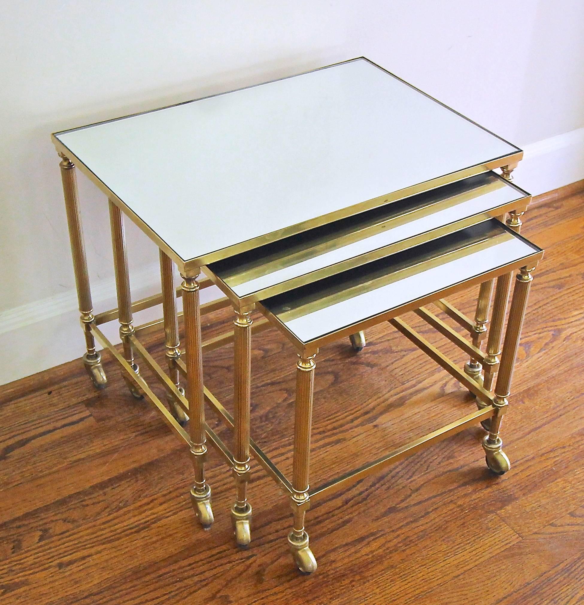 Lacquered Trio of French Brass Mirrored Top Nesting Tables For Sale