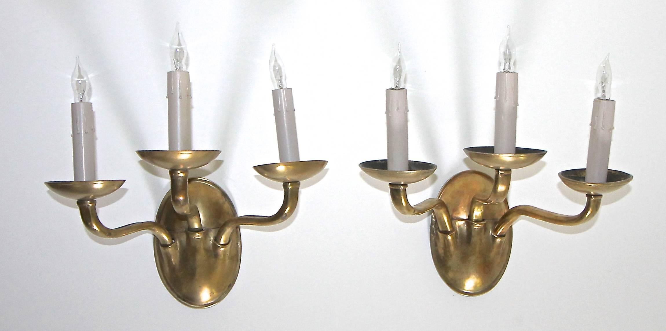 American Pair of E F Caldwell Arts & Crafts Three-Arm Brass Wall Sconces