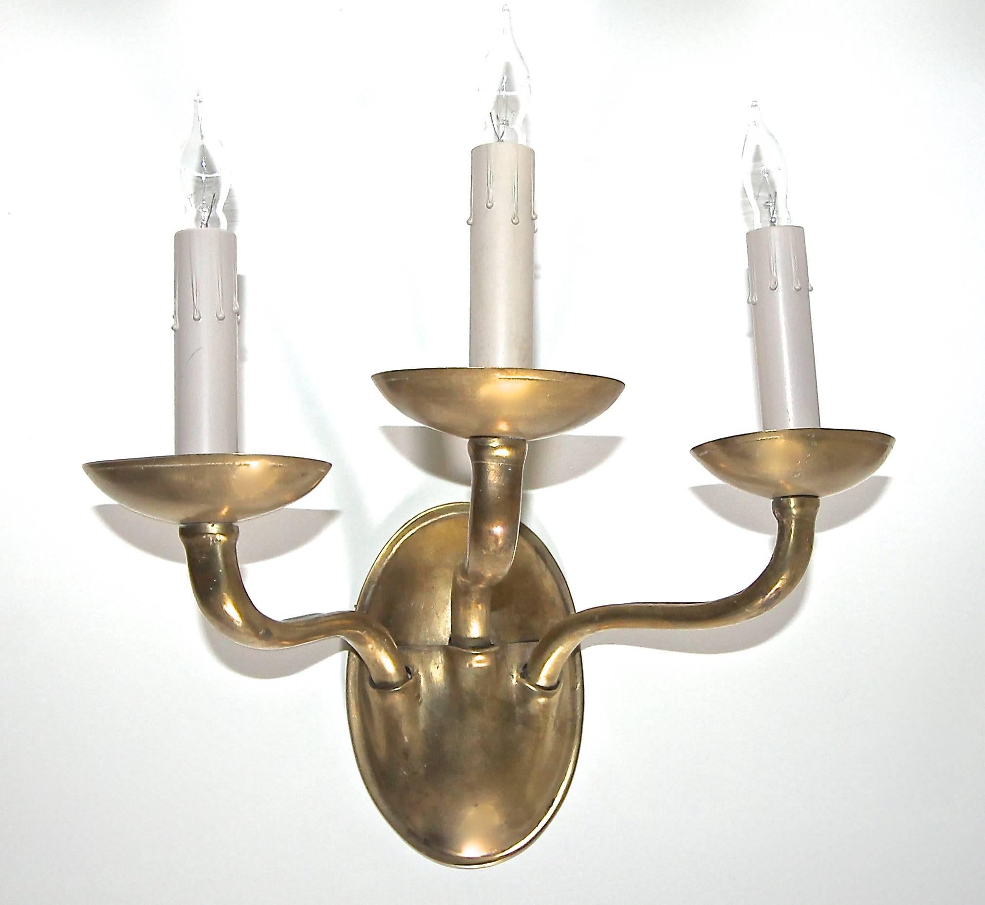 Early 20th Century Pair of E F Caldwell Arts & Crafts Three-Arm Brass Wall Sconces