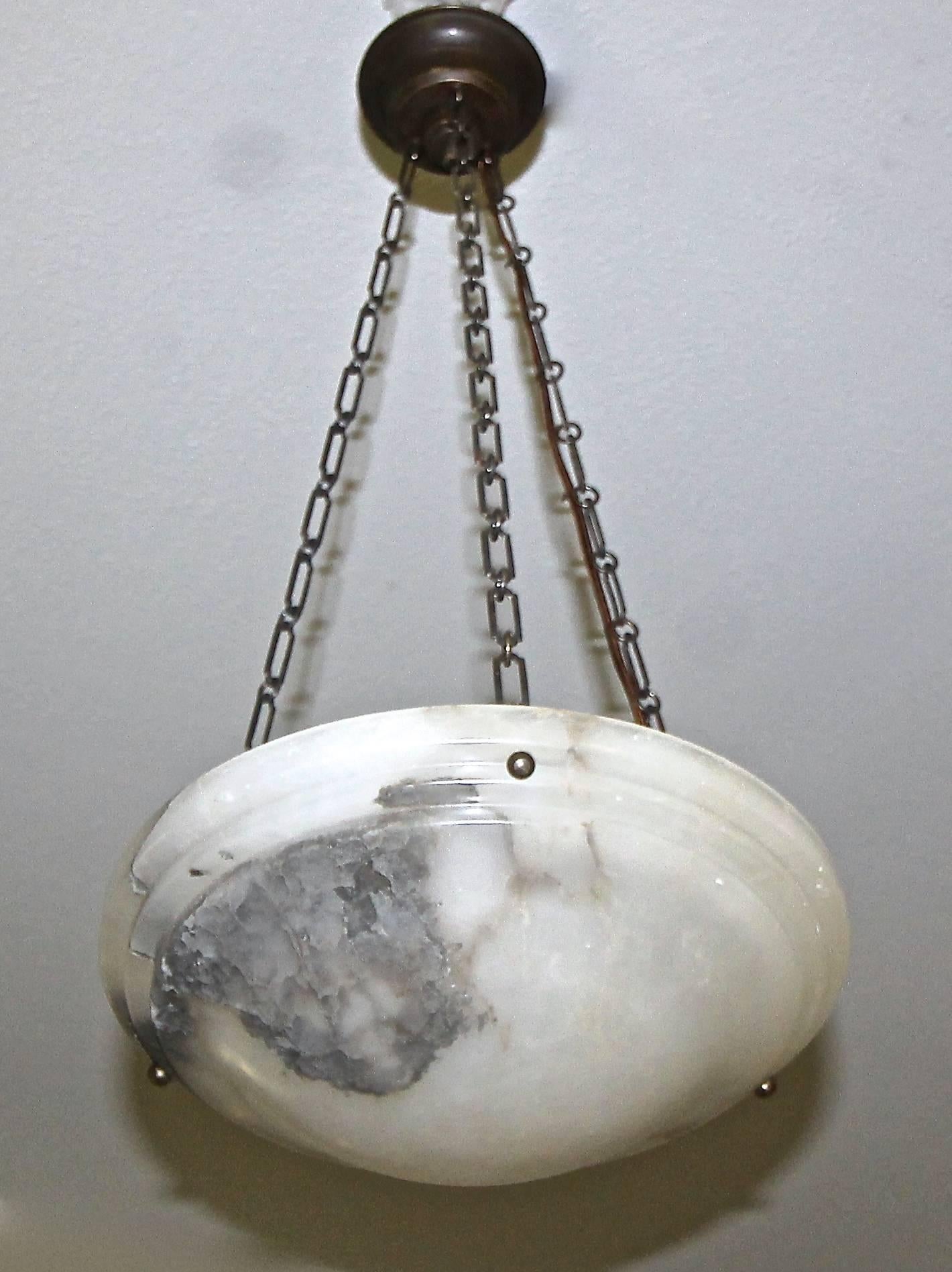 French alabaster chandelier or pendant with darkened bronze fittings in the Directoire style. Alabaster bowl is in very good condition with beautiful veining and is almost translucent when light. Fittings are delicately proportioned with the size