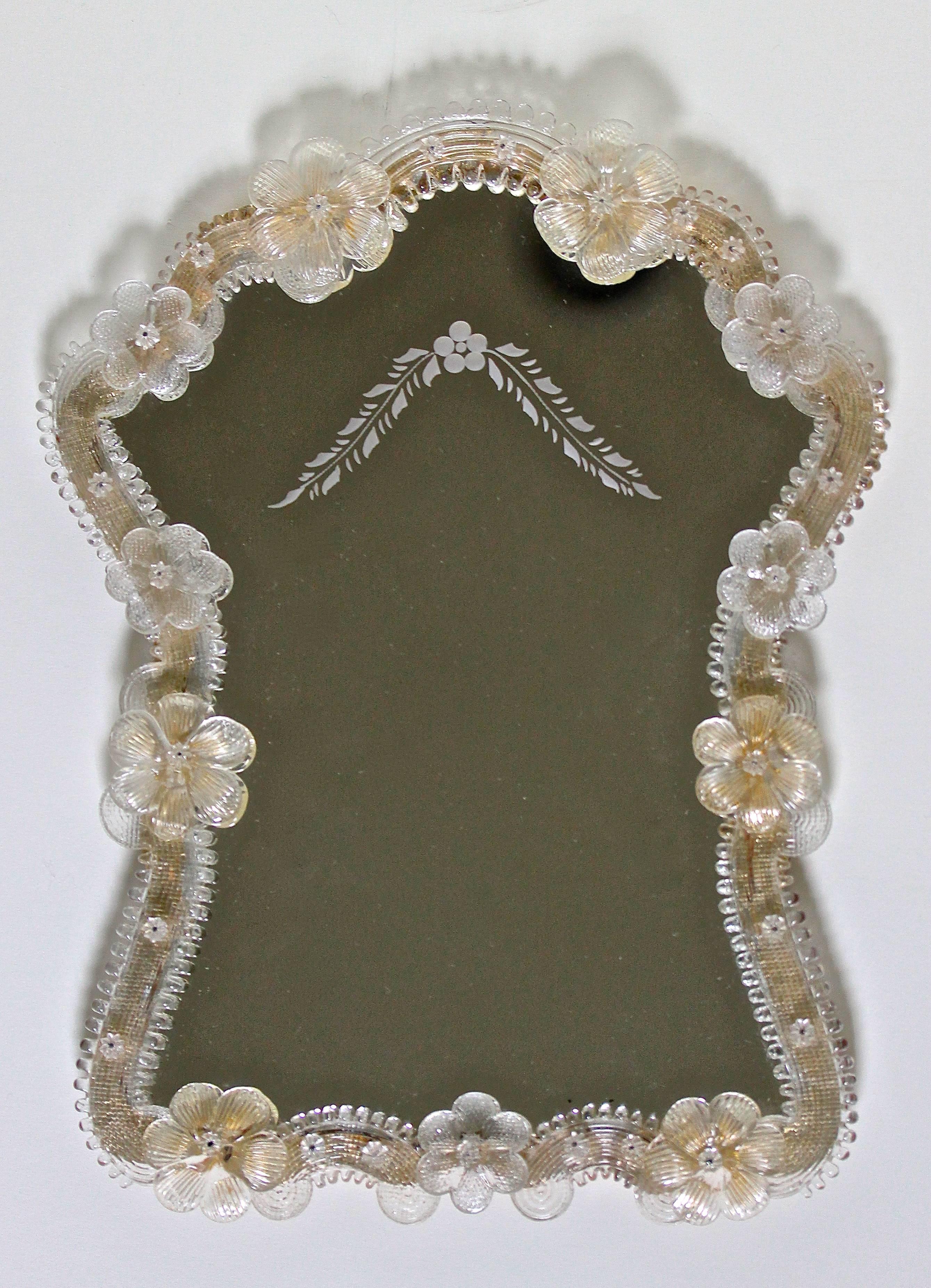 Diminutive Murano floral motif glass wall mirror with reverse etched details on mirrored glass.