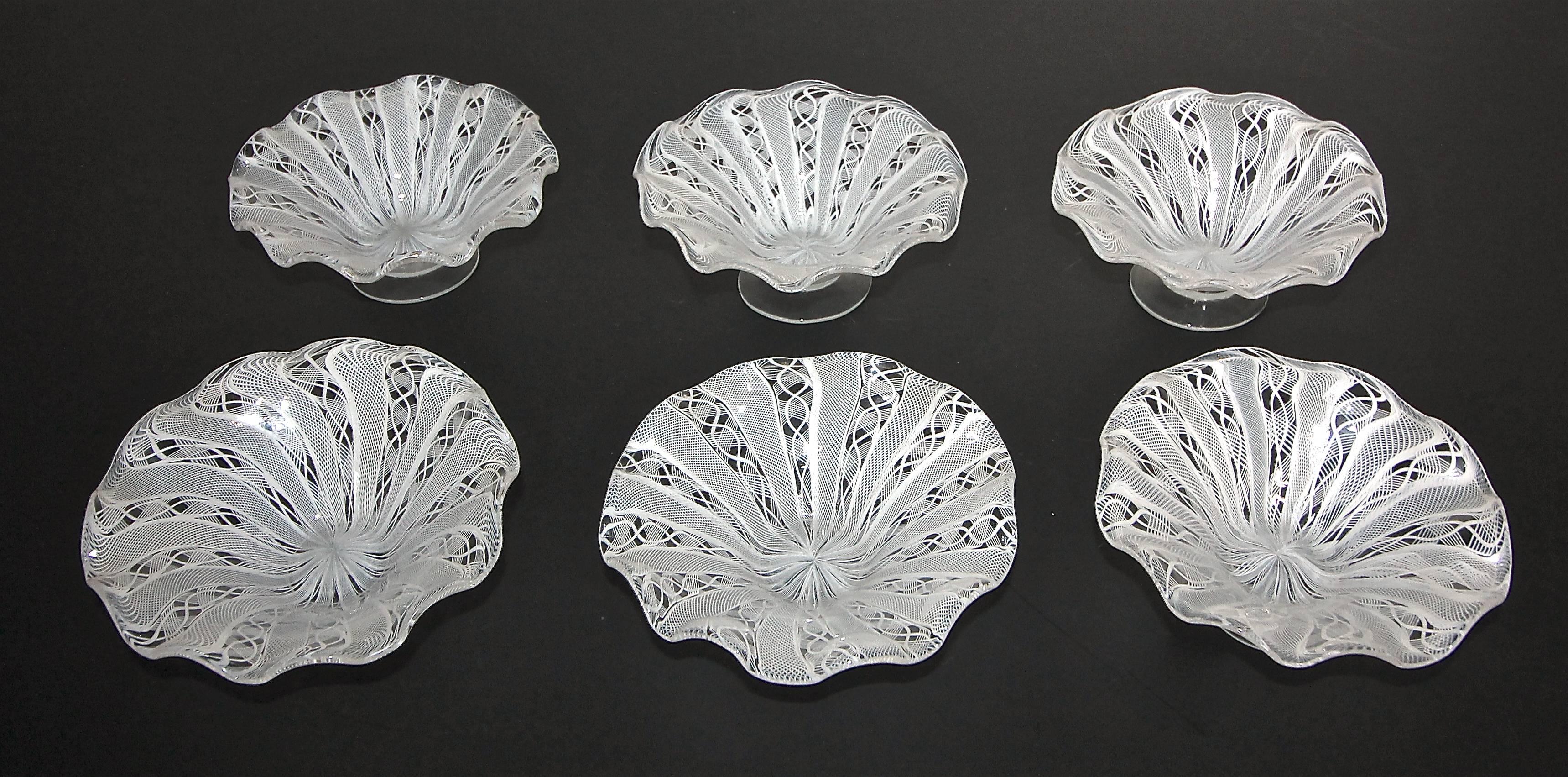 Set of six handblown clear and white latticino Murano candy or dessert bowls or dishes, attributed to Salviati.