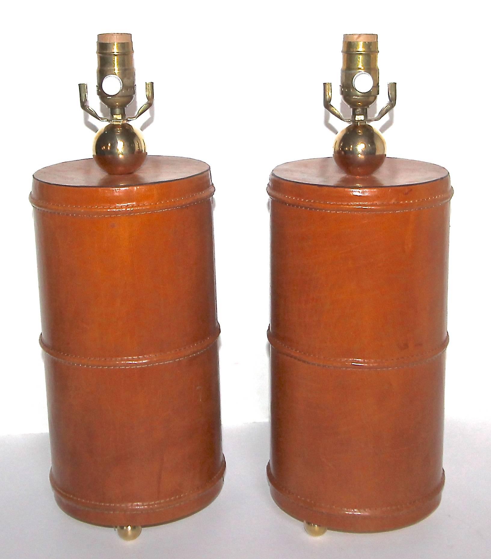 American Pair of Stitched Leather and Brass Table Lamps after Adnet