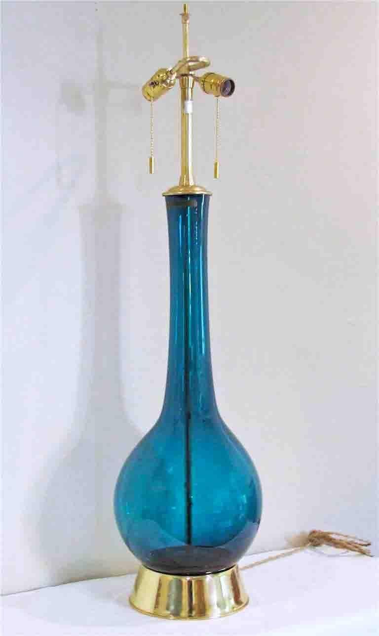 Hard to find large hand blown Marbro lamp with exquisite dark teal colored blown glass body imported from Sweden with brass fittings and newly brass plated base. Labeled 