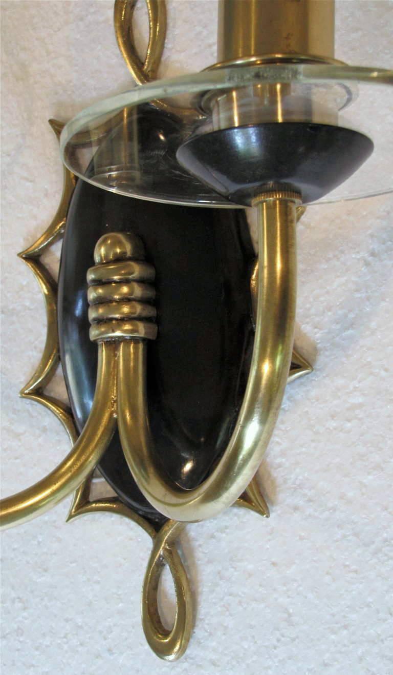 Mid-20th Century Pair of French Moderne Brass Patinated Wall Sconces For Sale