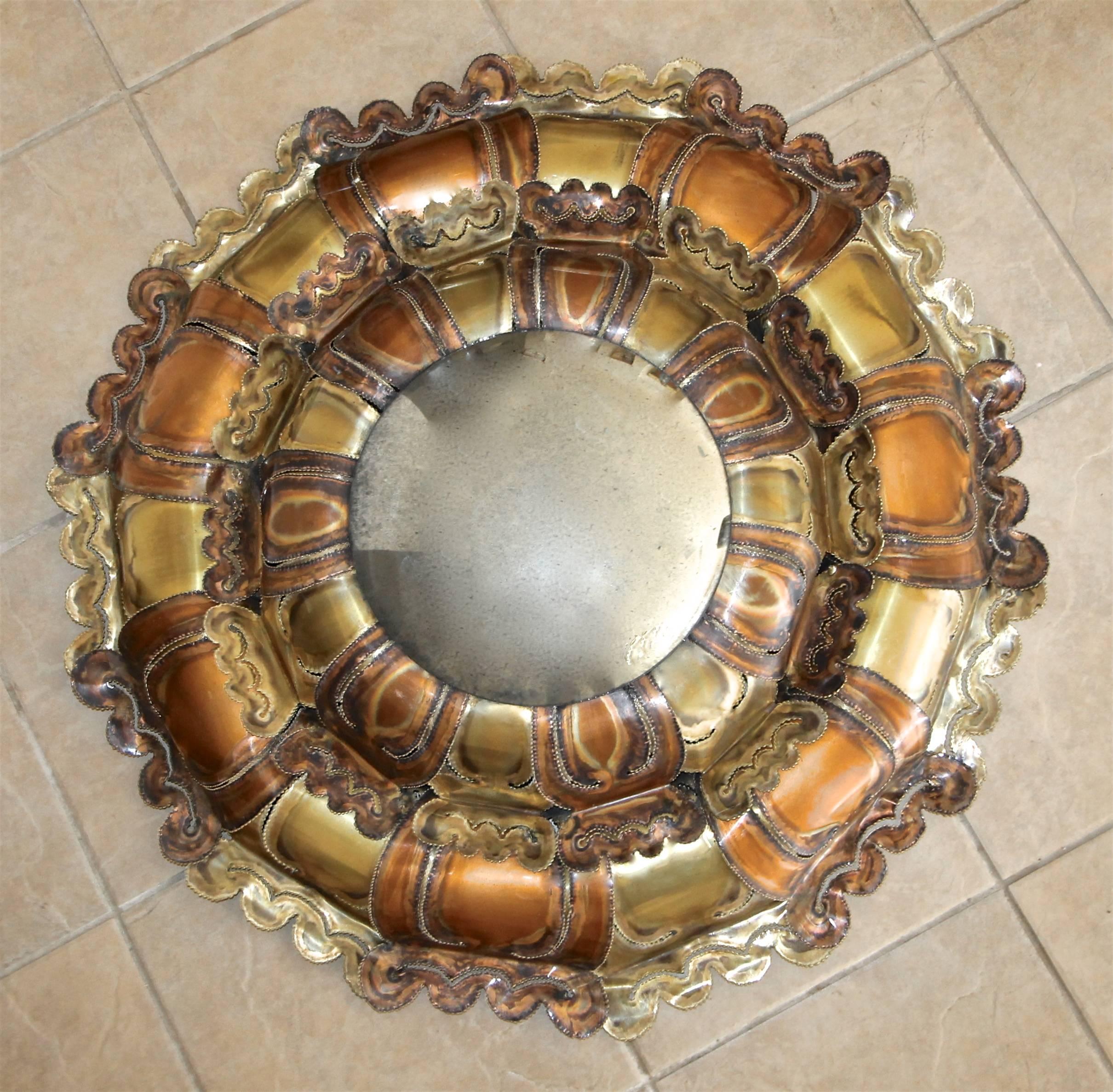 Large brutalist cooper and brass torch cut sunbrust wall art with attached convex antiqued mirror. 