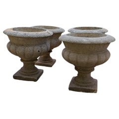 4 maceteros y jardineras británicos de piedra moldeada