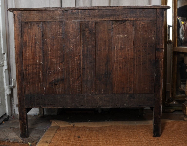 A French L16 sandpapered commode with 3 drawers, connections with wooden pins.