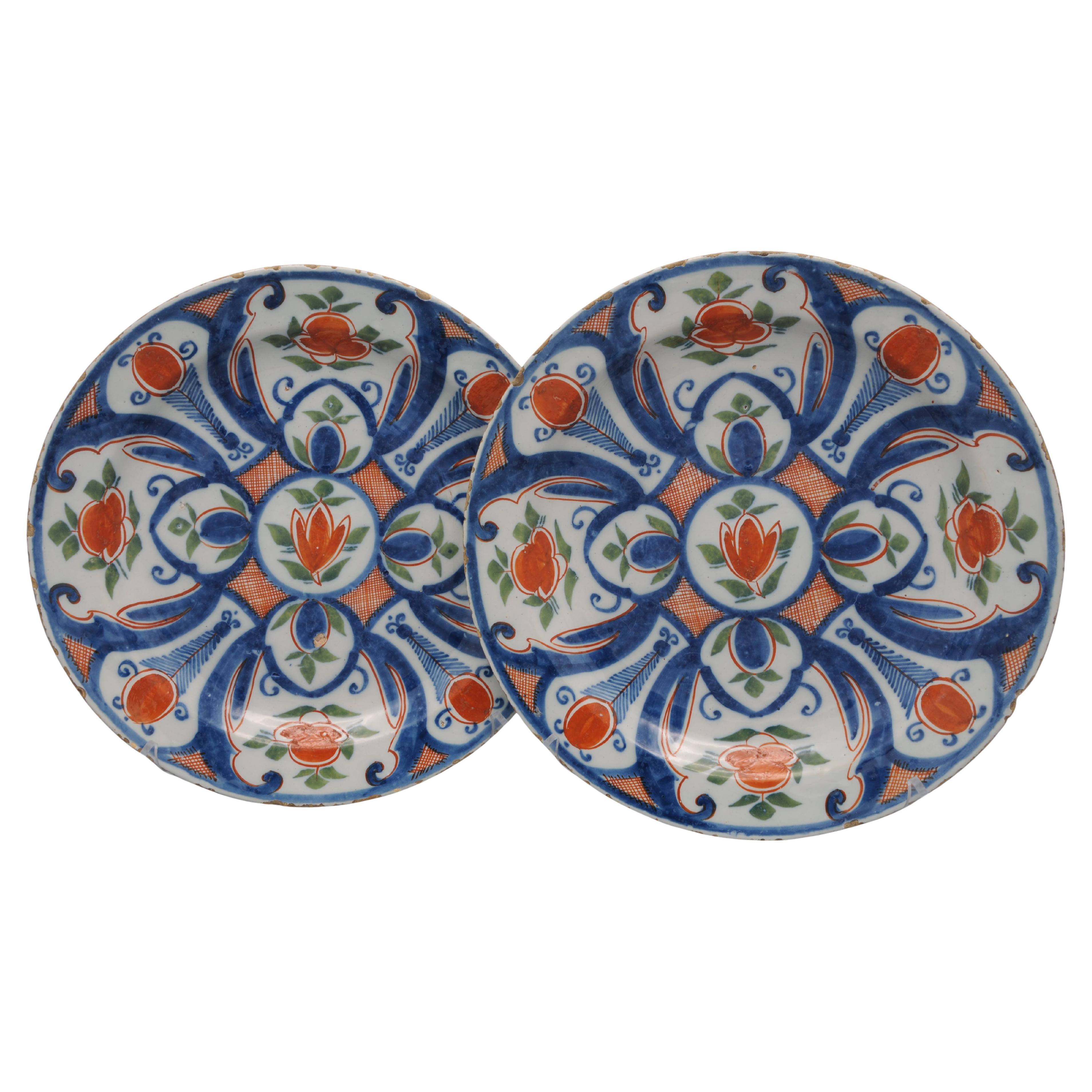 Delft - Pareja de platos azules, verdes y naranjas de "De Paauw" - Siglo XVIII en venta
