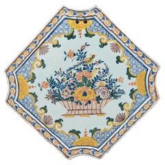 Polychrome Delftware Wall Plaque with Bird and Flower Basket, Delft, circa 1750