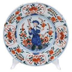 Piatto antico olandese in ceramica di Delft policroma con motivi floreali, Delft, XVIII secolo