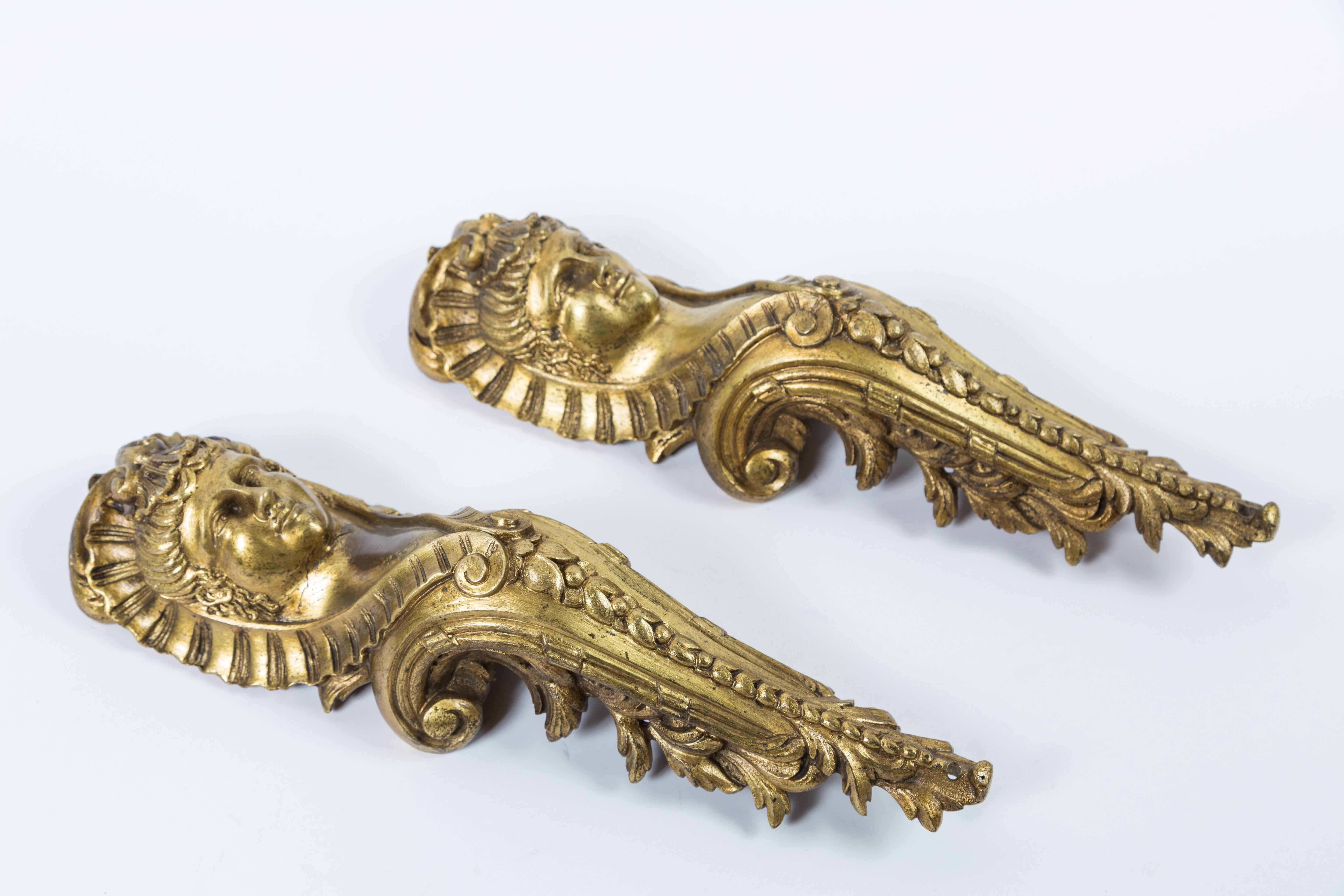 Heavy brass applique with Classic detailing, two pairs available.