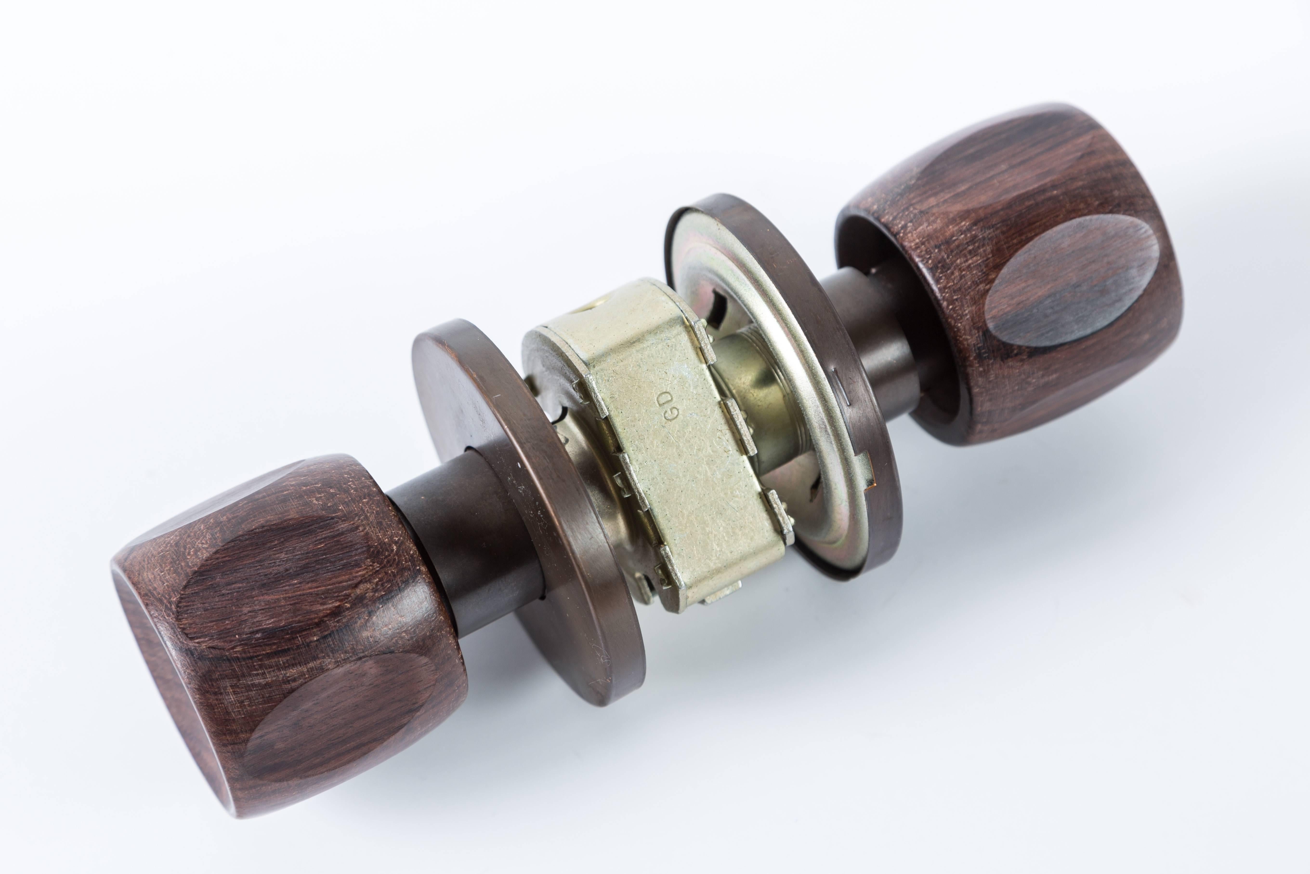 Old stock Russwin wood door knob set.