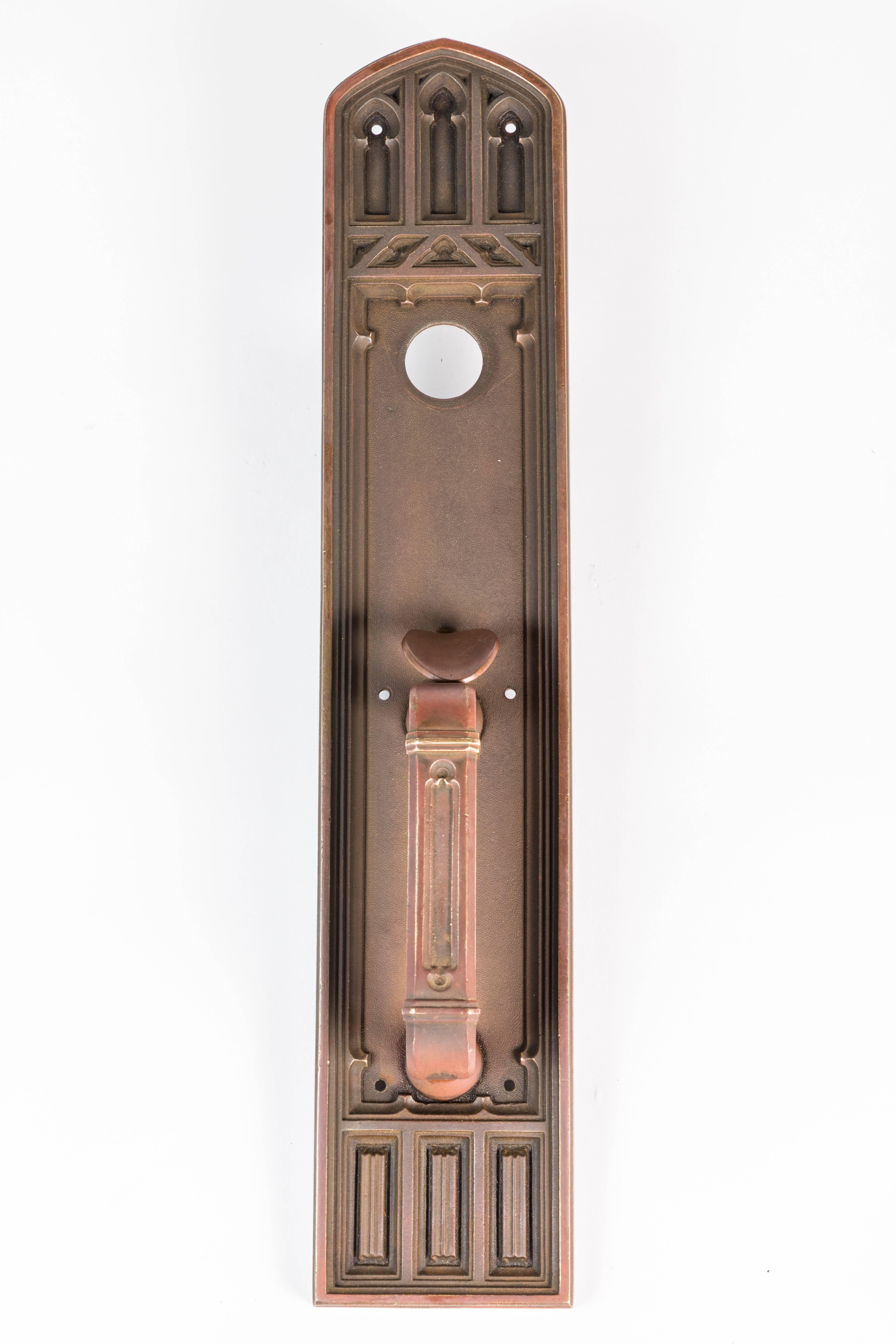 Cast brass exterior thumb lever door handle.