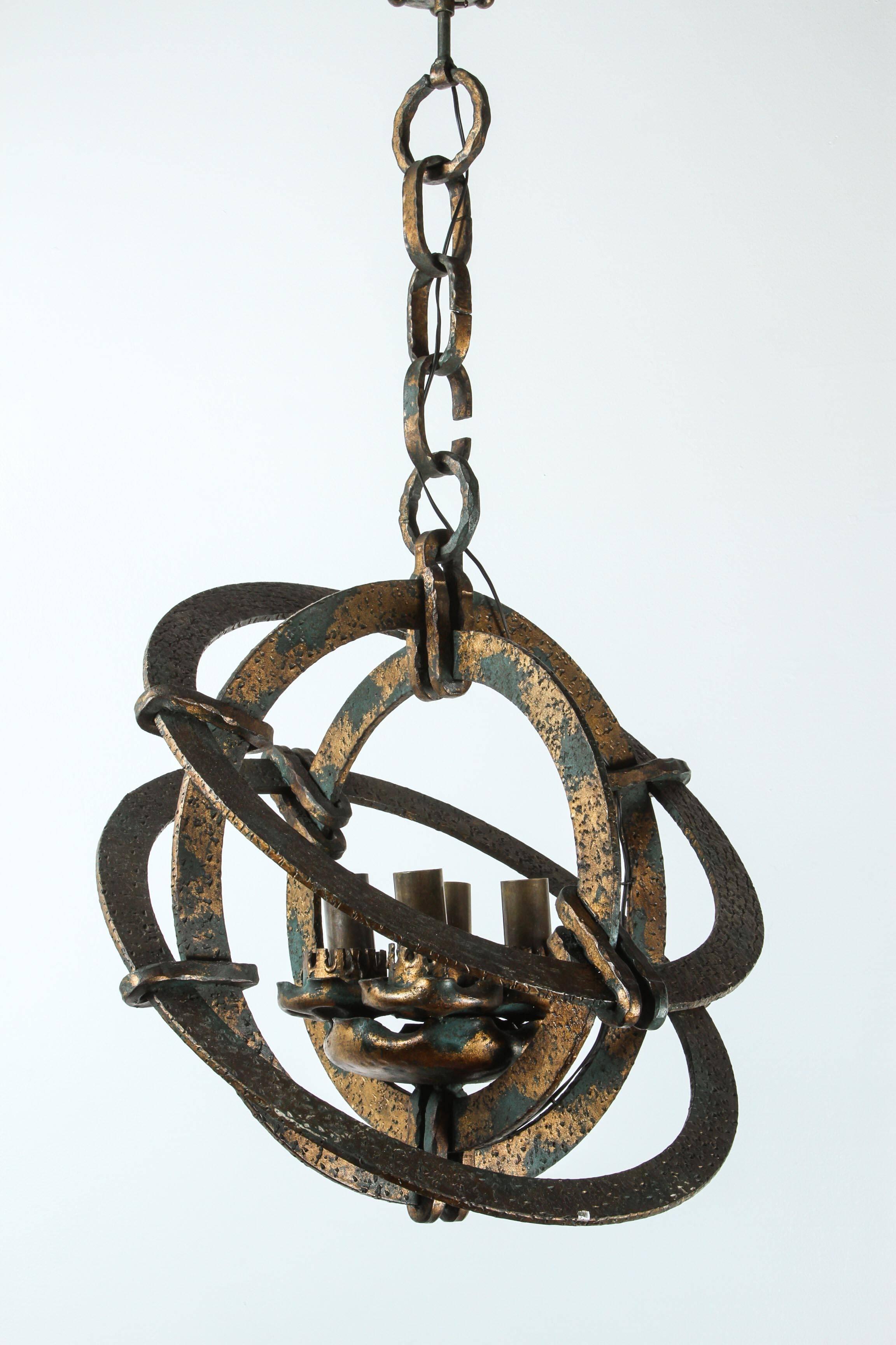 Mid-20th Century Italian Cast and Hammered Iron Chandelier For Sale