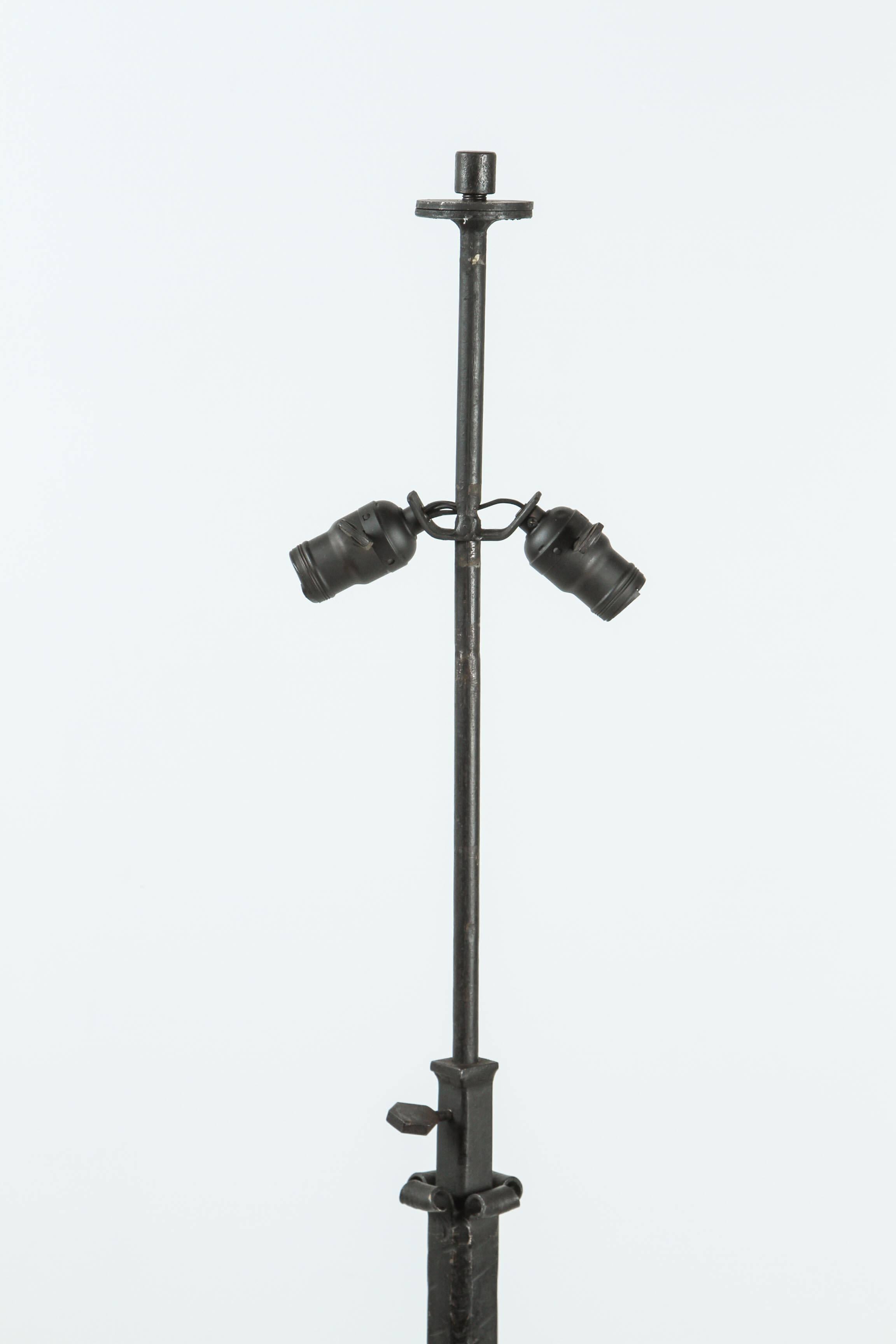 Adjustable Italian iron floor lamp with fine detailing. Height adjusts from 53 to 71 inches.