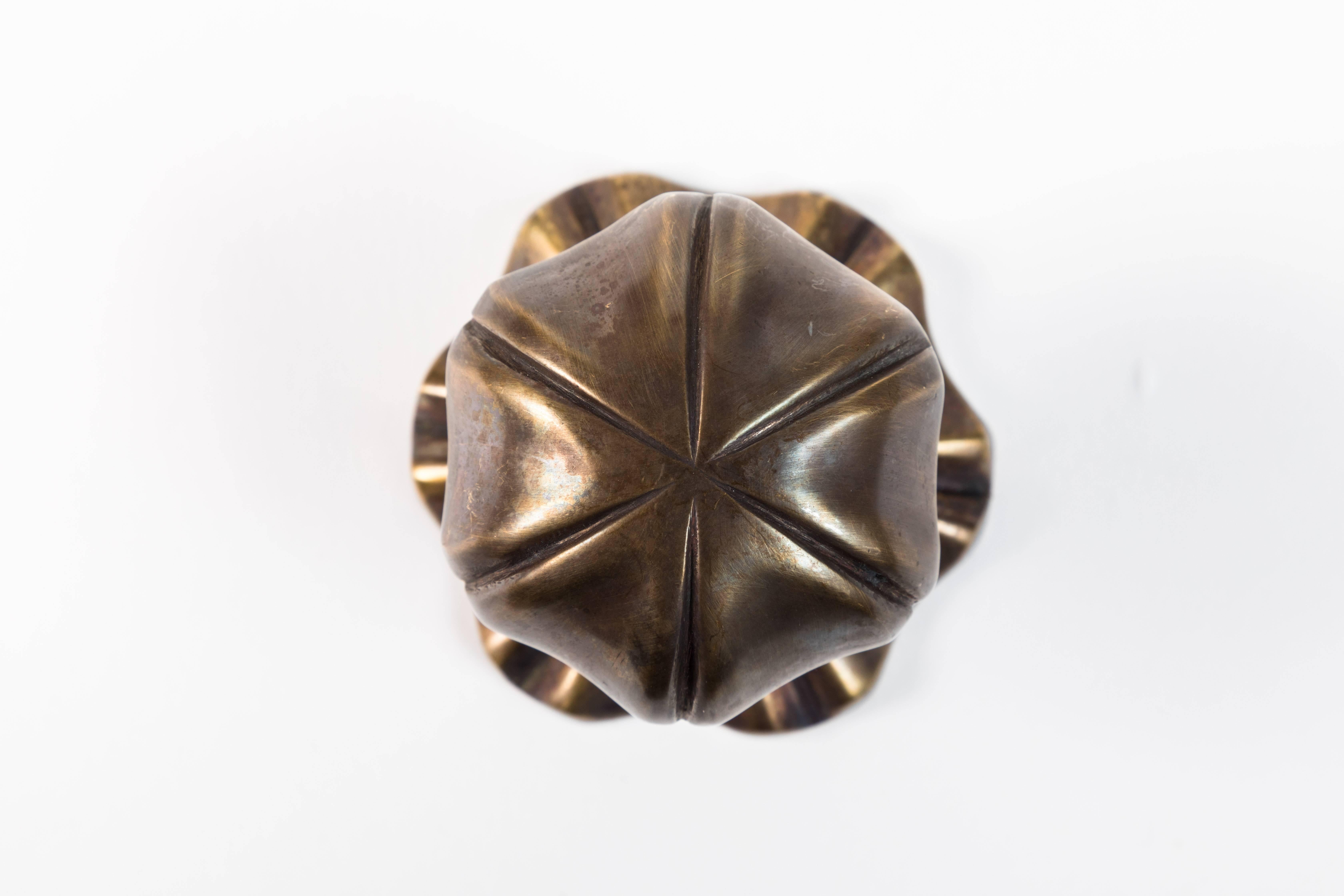 Brass doorknob and rosette set can be surface-mounted or used with a spindle.