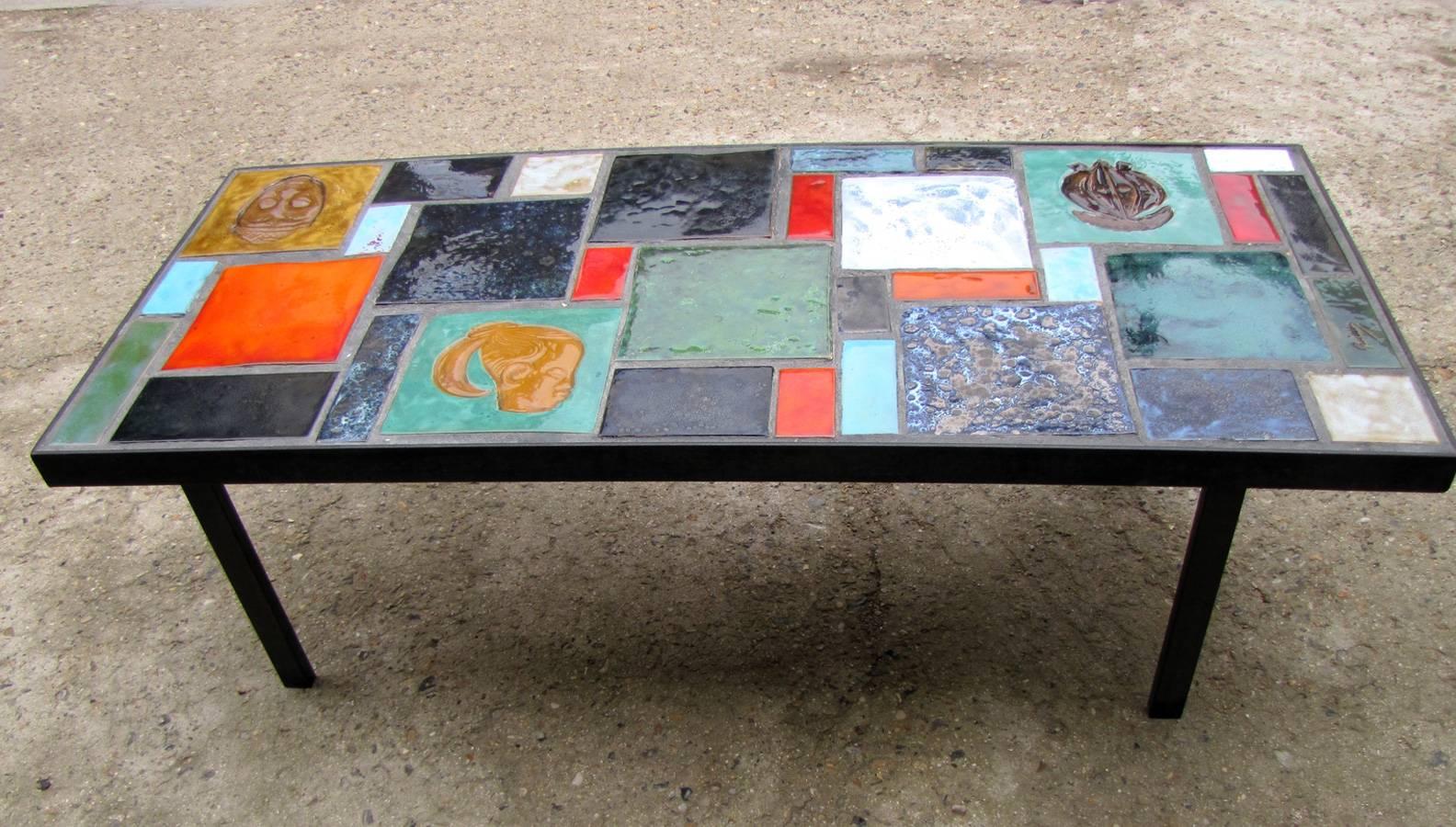 Coffee table with ceramic tiles plateau, Africanist decor. 
A tile is signed 