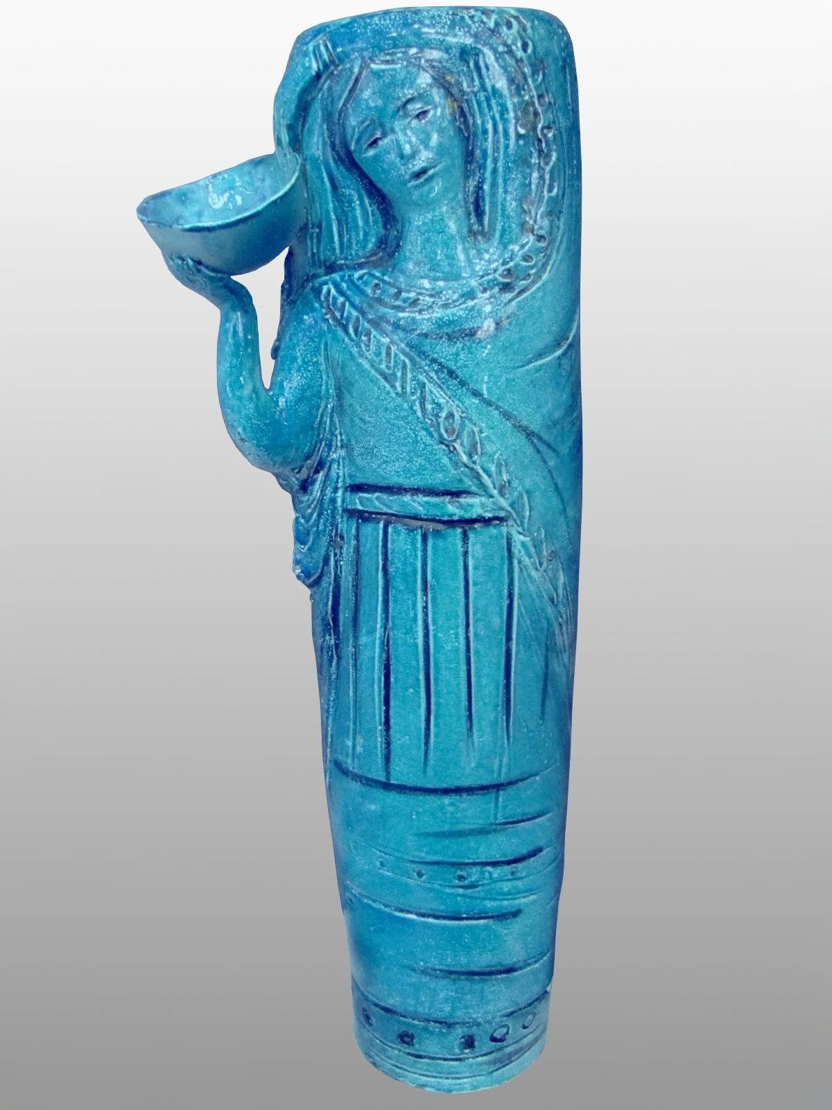 Grand vase-sculpture en faïence émaillée bleue d'Angelo Ungania (1905-1996). Pièce unique. Signé.

Angelo Ungania a étudié à l'École royale de céramique de sa ville.
Au début des années 20, il travaille comme décorateur à la manufacture 
