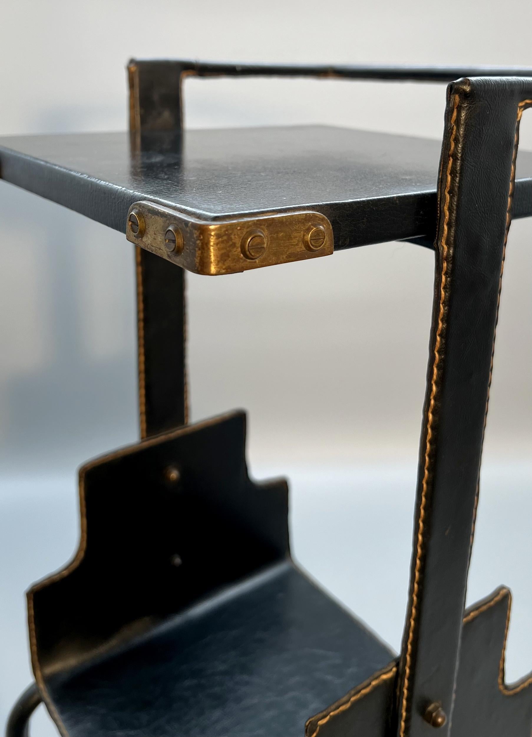 Mid-20th Century Small side table, by Jacques Adnet, Paris, France, circa 1950 For Sale