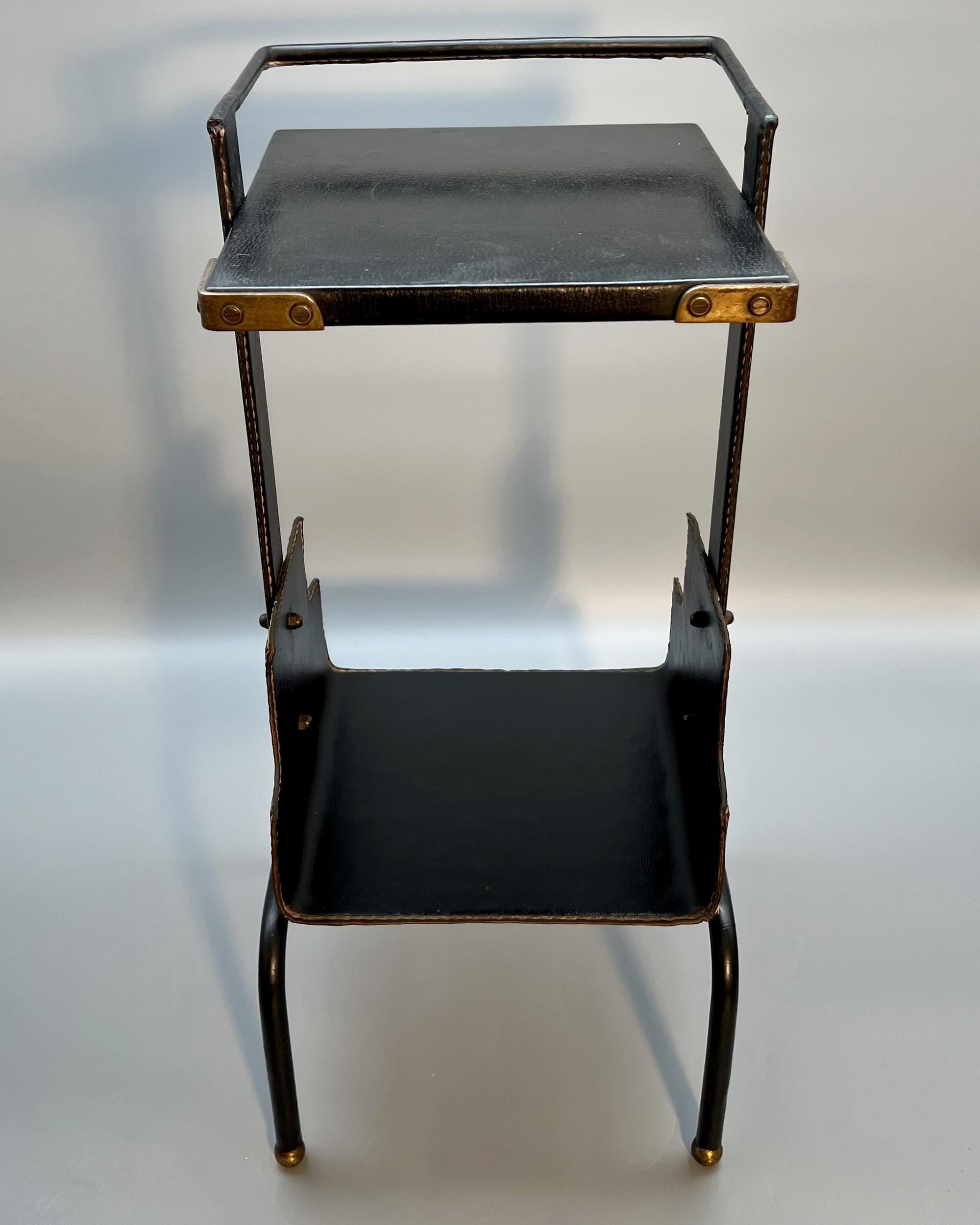 Mid-Century Modern Small side table, by Jacques Adnet, Paris, France, circa 1950 For Sale