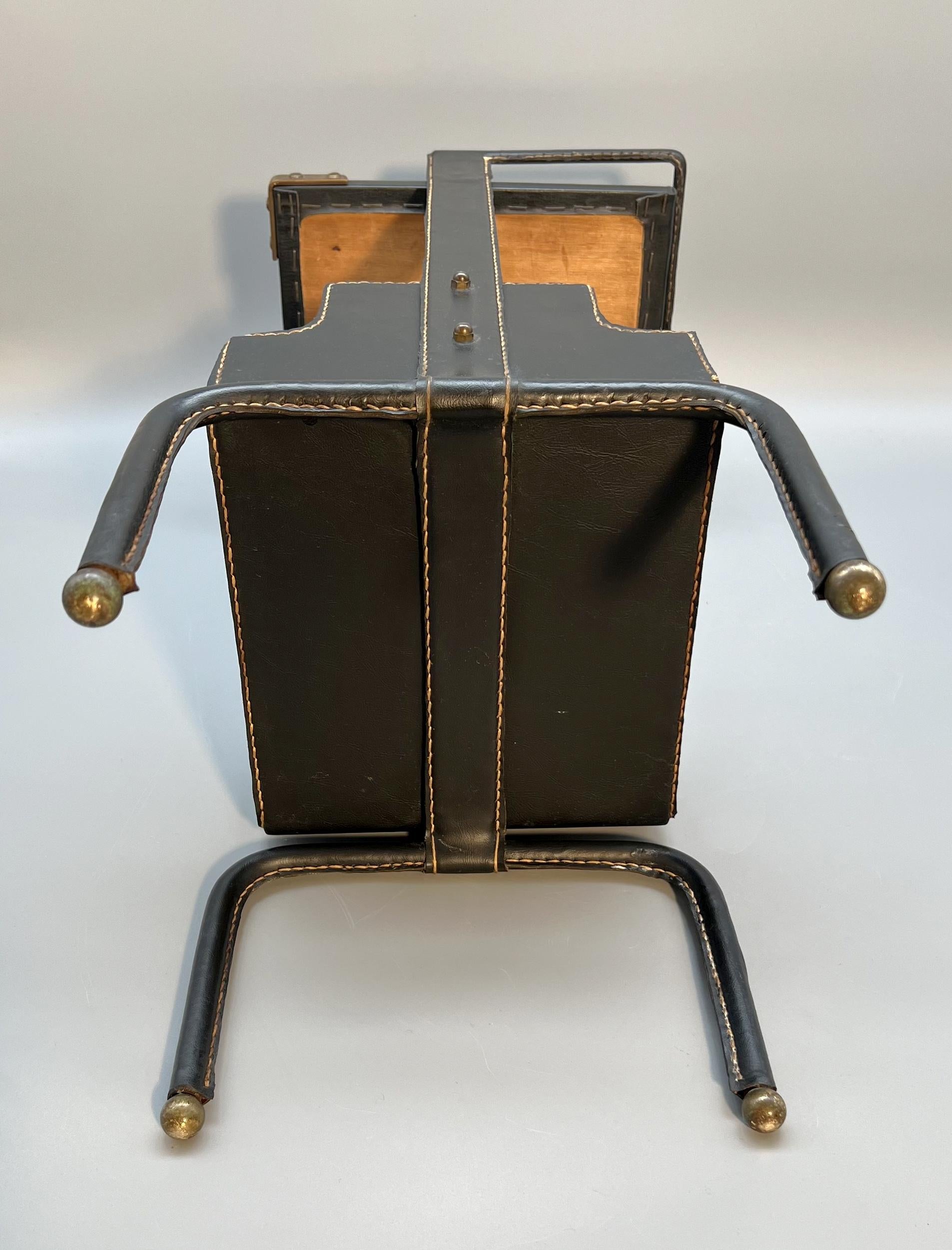 Metal Small side table, by Jacques Adnet, Paris, France, circa 1950 For Sale