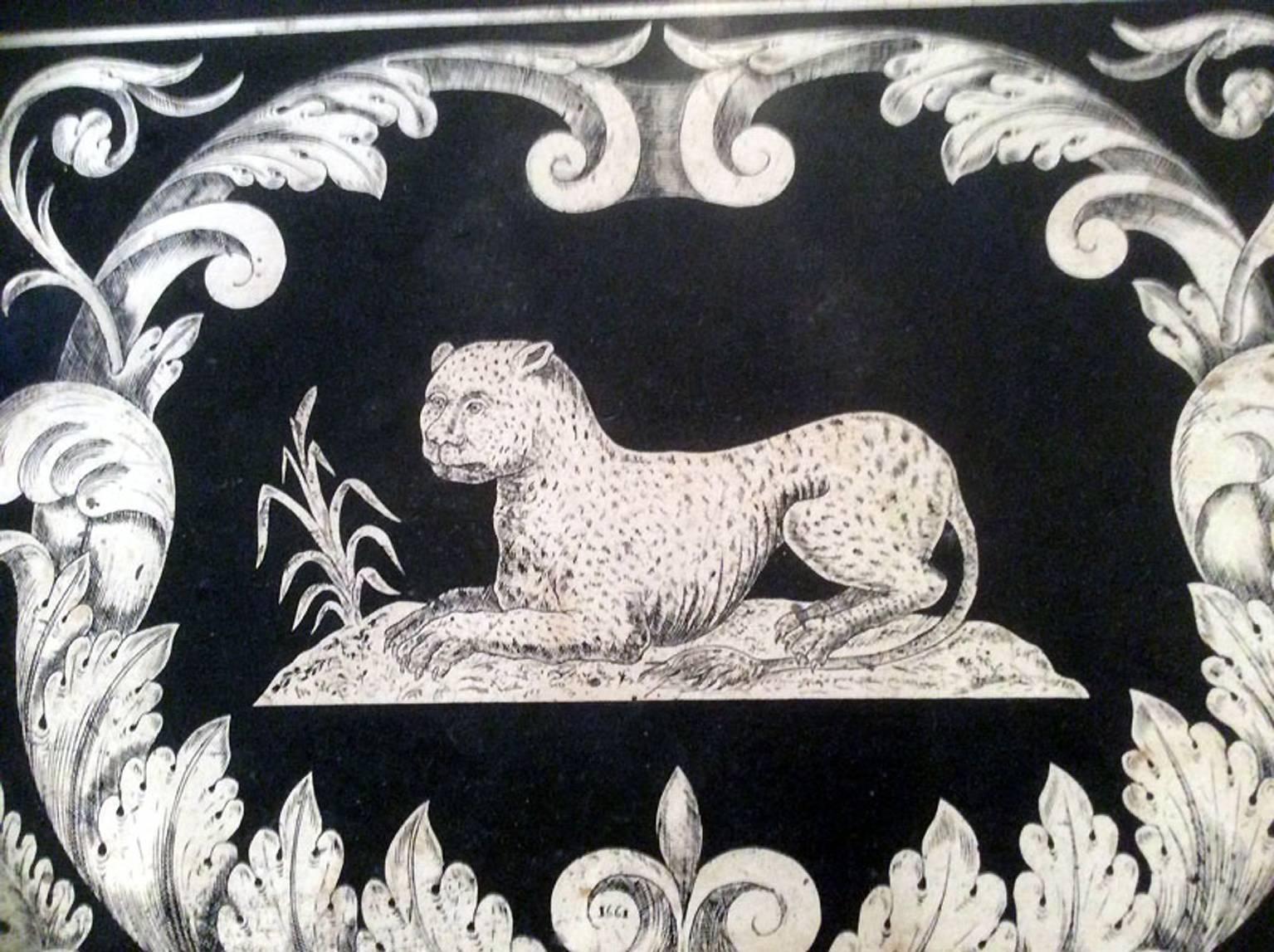 Rare Italian Scagliola table top in black and white, dated 1661 in the decor. Fine scene of a leopard, putti playing in vine branches, acanthus leaves, flowers and lilies. Can be used in table top or wall decoration, like a painting.