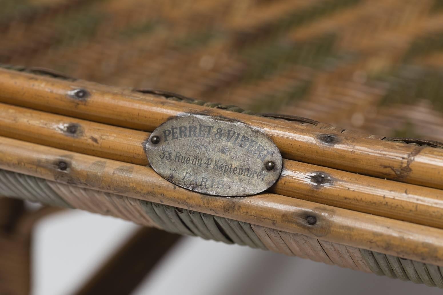 Beautiful 19th century French chaise longue by Perret et Vibert.
The piece is composed of green and natural braided rattan on a bamboo structure.
With Perret et Vibert metal label.