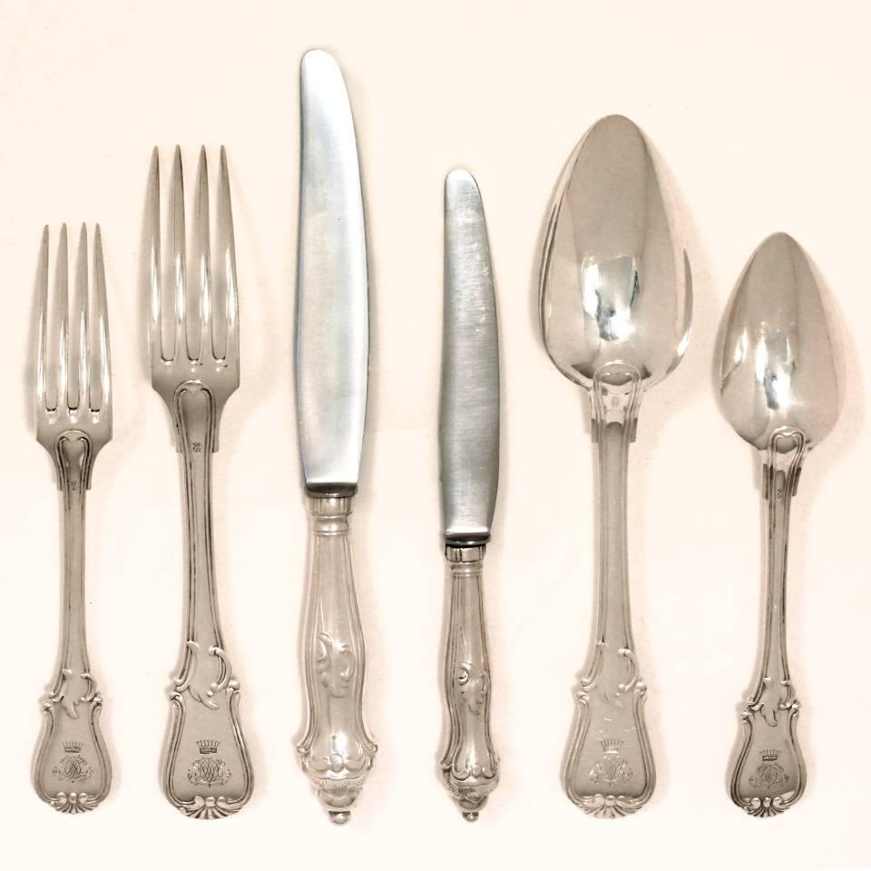 Circa 1850-1870s, .812 Fineness solid Silver, Germany. This Baroque revival silver service for 18 is perfect for casual and formal entertainment in any décor. The asymmetric swagged motif with its shell terminus has an elegant sleek look. The large