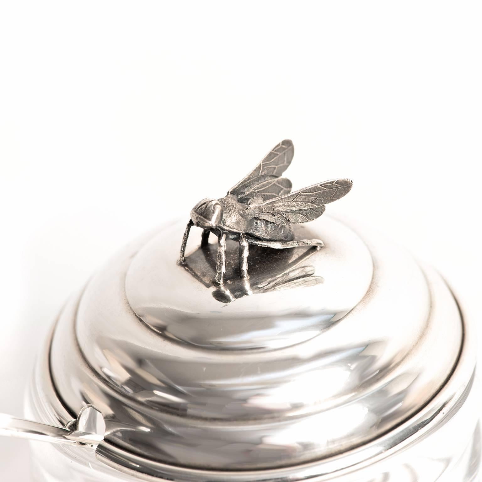 Circa 1920s, sterling, by Blackinton, American. An exquisitely detailed bee perches atop this delightfully figural honey jar. Filled with honey, this piece sets a charming table or will make a stellar hostess gift. Finely made by Blackinton, it is