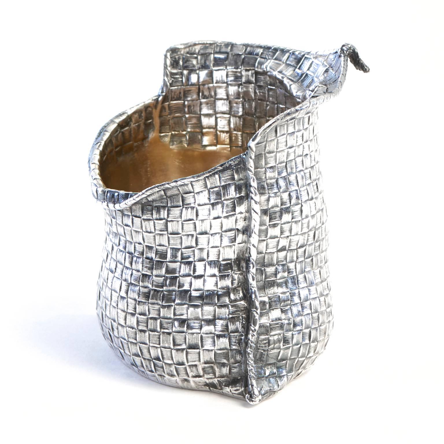 Sterling, Mario Buccellati, Italy, circa 1950s. This sterling figural sack is an unusual example of early Buccellati silver. Known for gorgeous quality silver-smithing and stunning design work, Mario Buccellati combined old world craftsmanship with